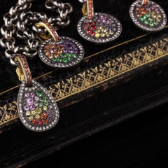 Estate 18 Karat Yellow Gold Black Rhodium Diamond and Gemstone Charm Bracelet