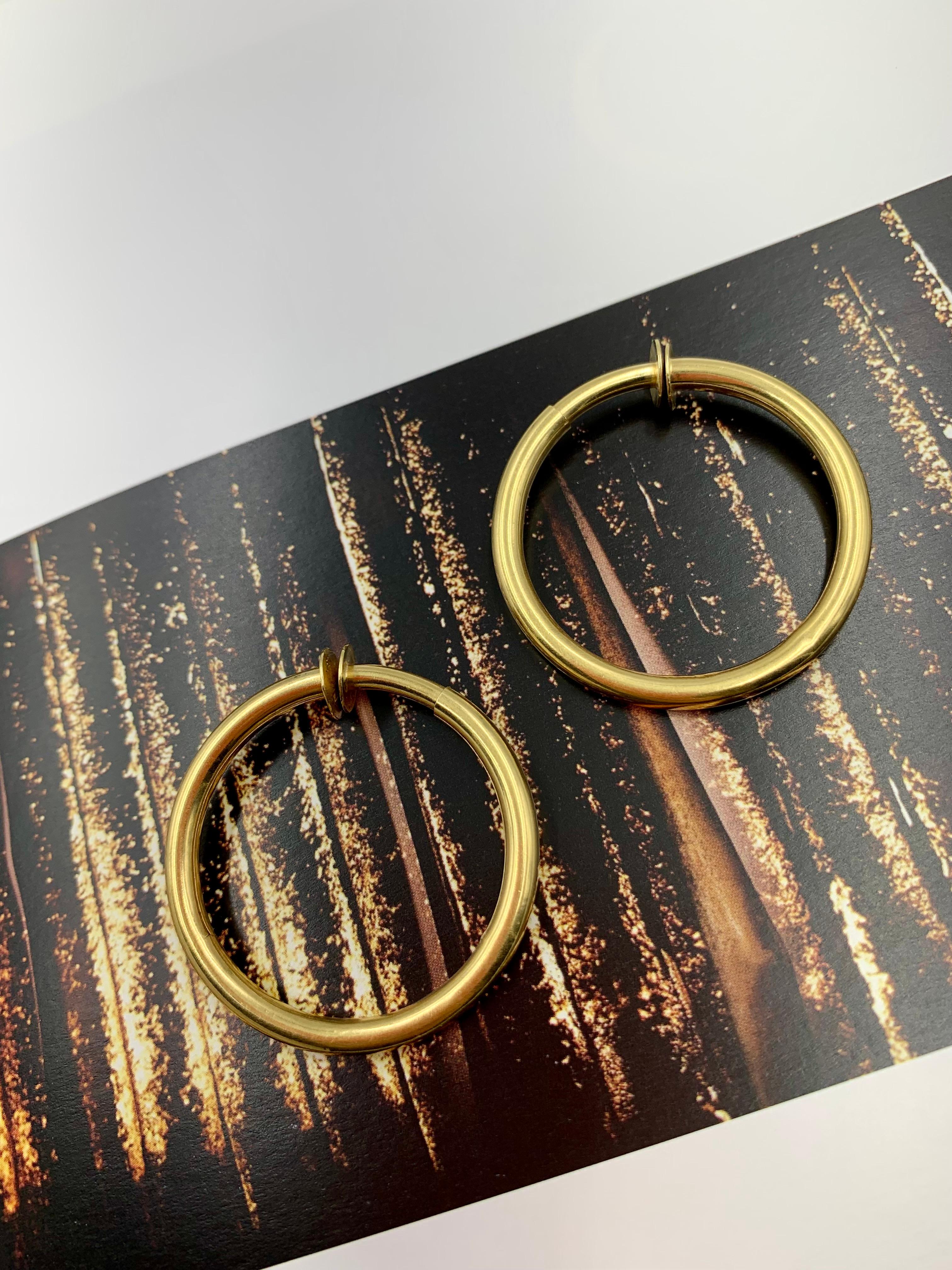 Large beautiful classic signed 18K yellow gold hoop earrings
20th Century
Diameter: 1.32 inches
Weight: 7.8 grams
Marks: 750 for 18K gold, signed with maker's mark in greek
High quality consistent with Zolotas or Lalaounis.
Condition: Very