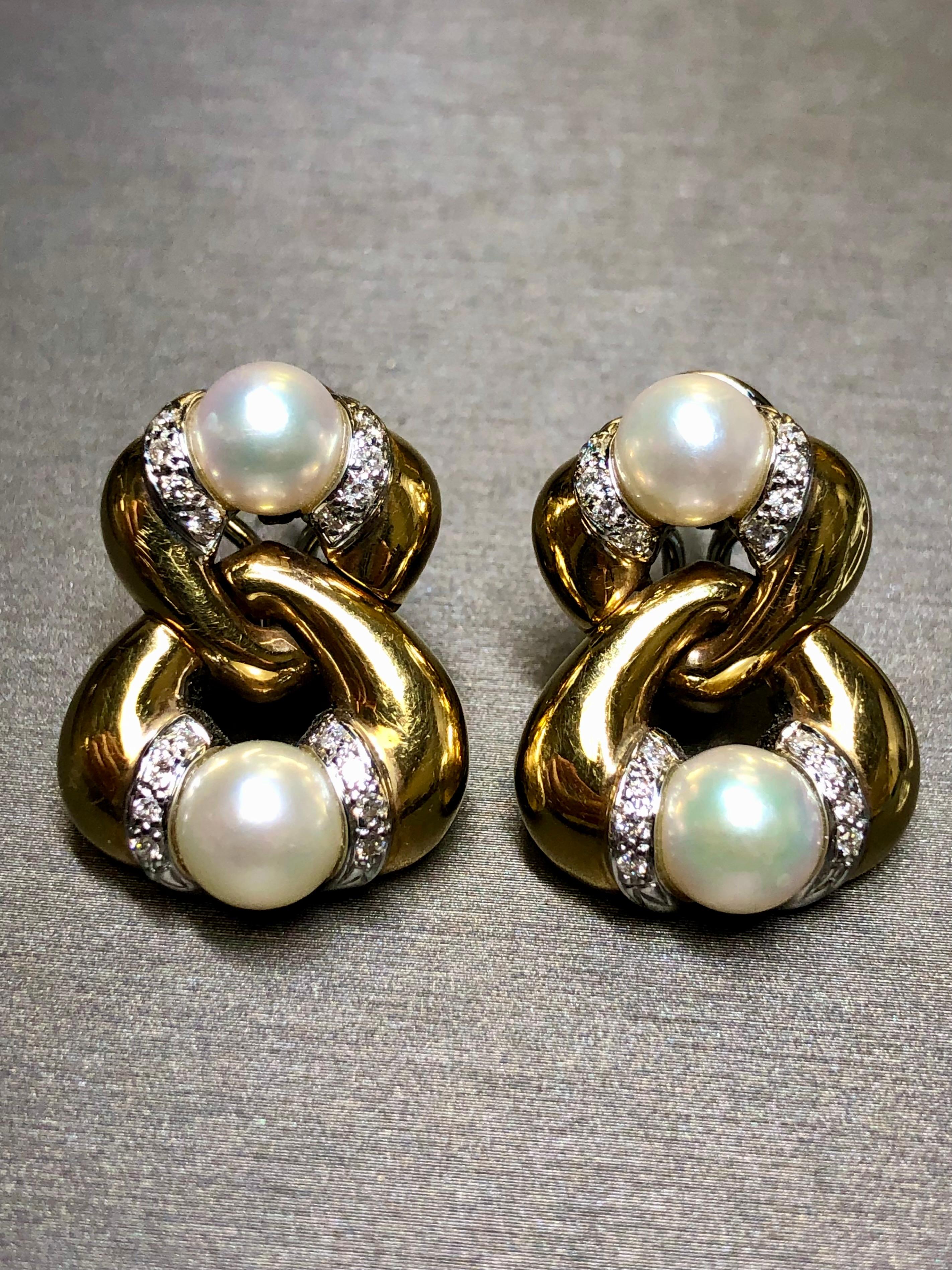 Women's or Men's Estate 18K Yellow Gold Diamond Pearl Interlocking Omega Back Huggie Earrings For Sale