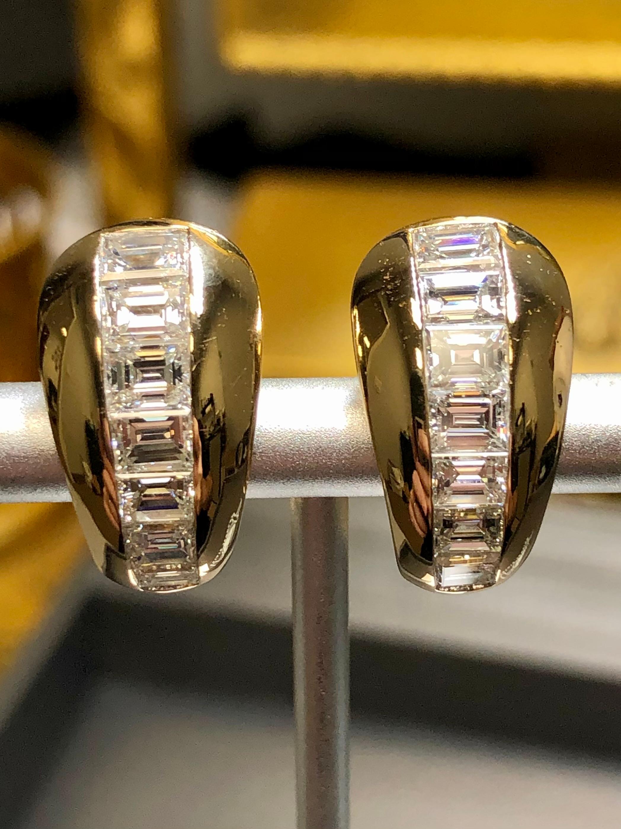 These earrings just scream quality. They are done in 18K yellow gold and channel set with large, baguette cut diamonds ranging G-I in color and Vs1+ clarity with a total approximate weight of 3.40cttw. Stones range .15ct to .30ct each. Earrings have