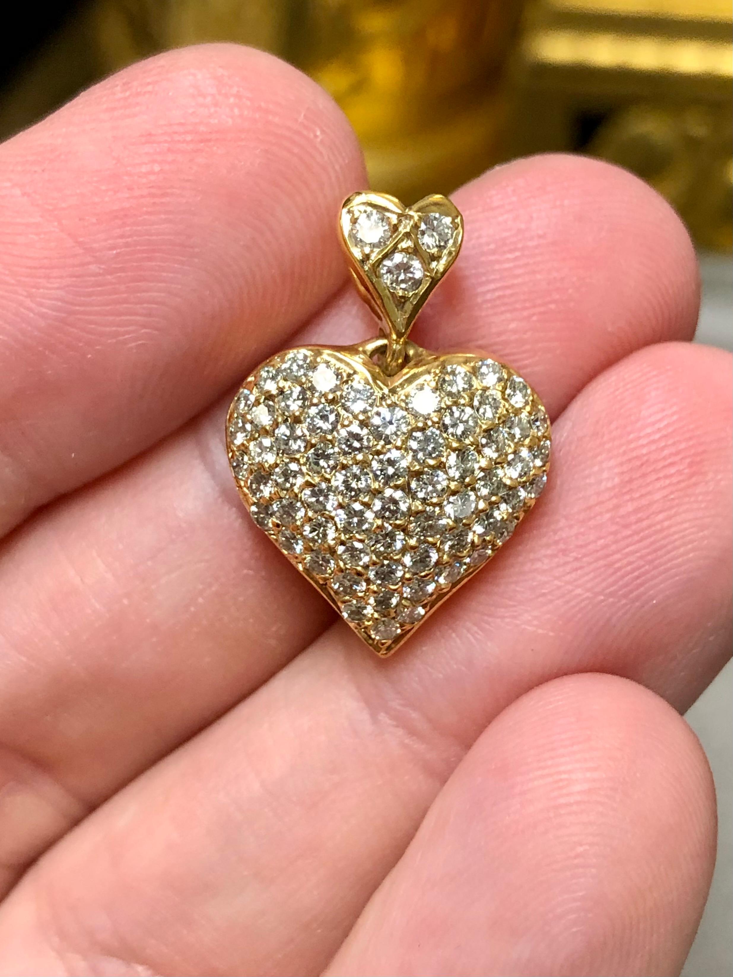 
A nicely done classic heart pendant crafted in deep 18K yellow gold and set with approximately 2cttw in G-H color Vs1 clarity round diamonds. Absolutely no excuses to be a made here!


Dimensions/Weight:

Pendant measures .95” by .65” and weighs