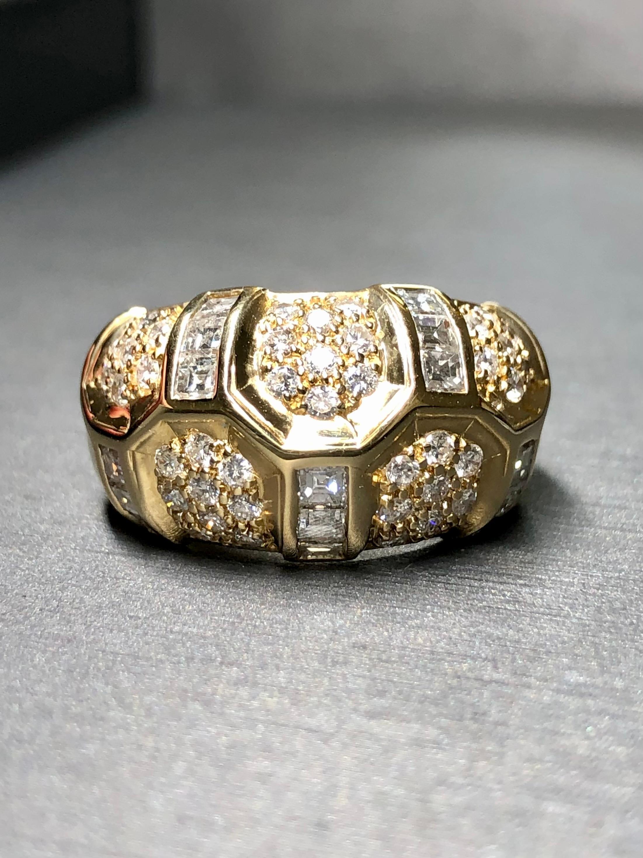 
A very pretty contemporary ring done in 18K yellow gold set with approximately 1.60cttw in H-I color Vs1-2 clarity round and square baguette diamonds.


Dimensions/Weight:

Ring measures .50” wide at the top and weighs 10.9g. Size 6.75