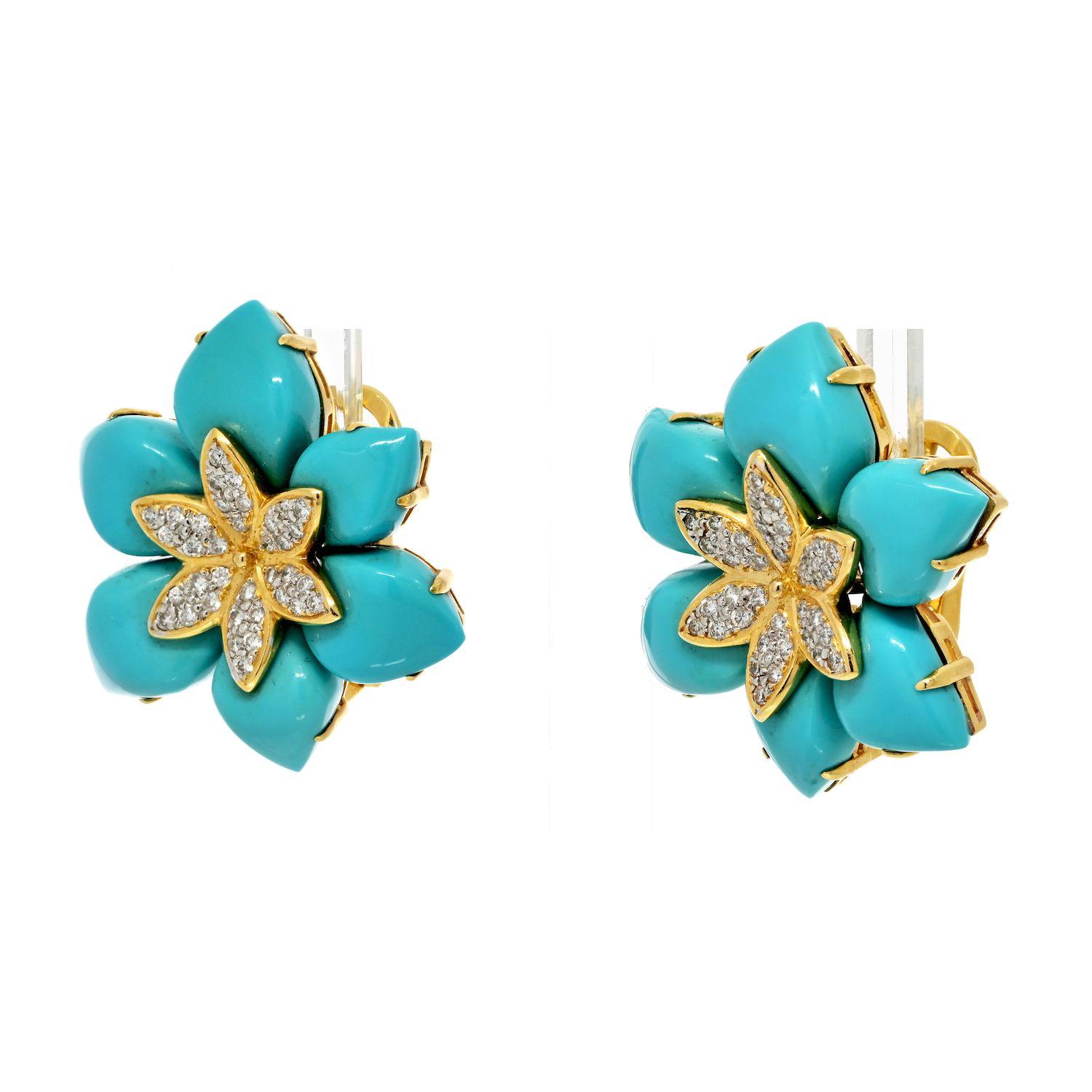 The estate 18K Yellow Gold Turquoise Earrings with Pave Diamonds in the center are a magnificent pair of earrings that effortlessly blend elegance and vibrant color. Crafted in 18K yellow gold, these earrings showcase exquisite turquoise gemstones