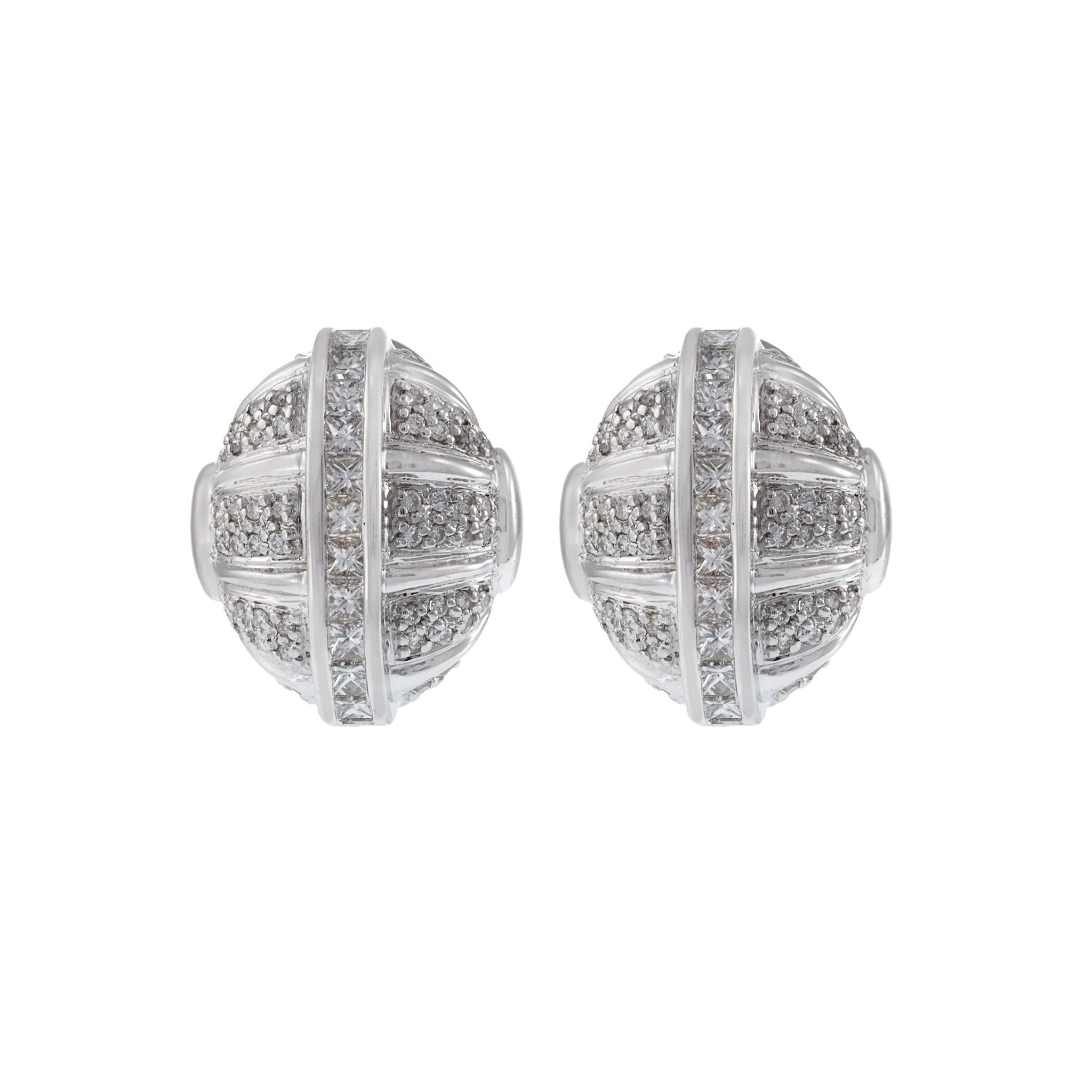 Add a touch of elegance to any outfit with these exquisite 18KT white gold puffed diamond earrings. Boasting 1.50ct-tw of high-quality round cut diamonds, these stunning earrings are the epitome of luxury. Each diamond is carefully selected for its