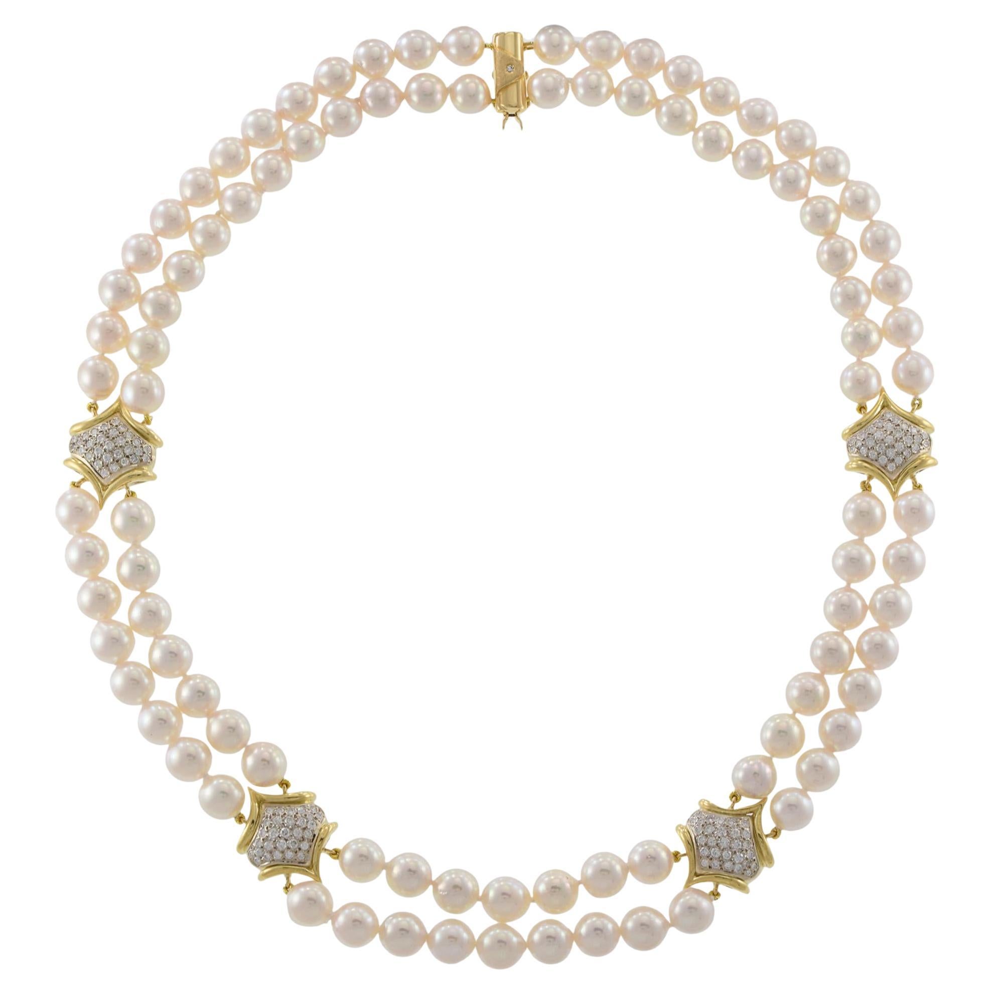 Collana Estate in oro giallo 18KT con doppio filo di perle Akoya e stazioni di diamanti