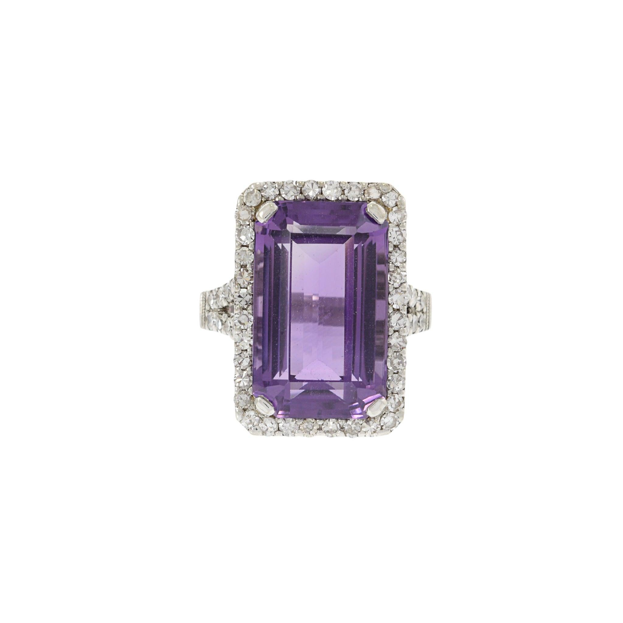 Expertly crafted with high-quality materials, this stunning estate 1940's ring features a total of 0.75 carats of European cut round diamonds and a captivating 12+ carat rectangular cut purple amethyst. Impeccable design and top-notch gems make this