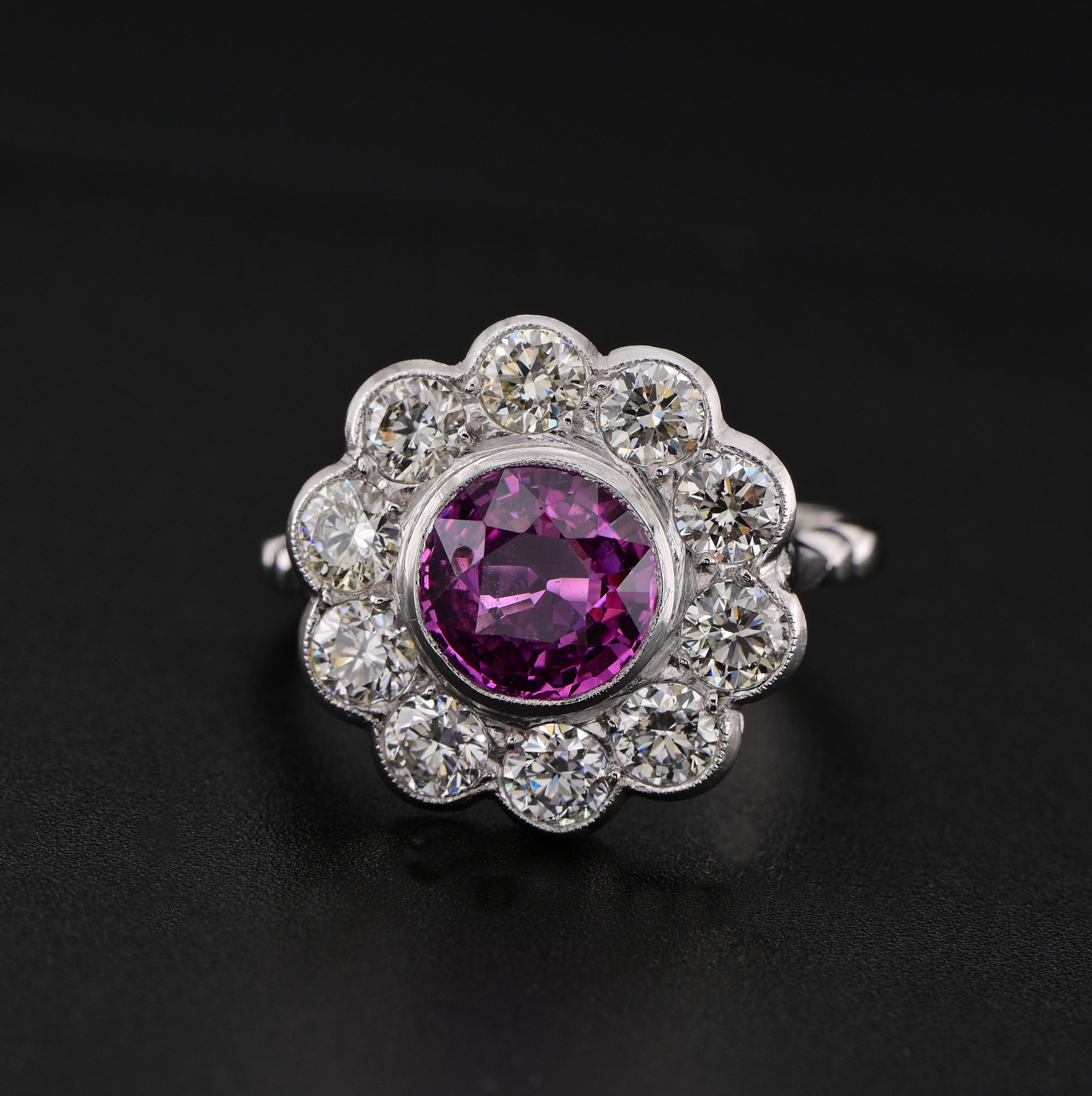 Pink Appeal
A majestic vintage ring in traditional cluster composition of Natural Pink Sapphire and rich Diamond surround, hand crafted in Platinum (marked) 1950 ca
Classy cluster design, composed by a rich and luscious rich Pink, round cut natural