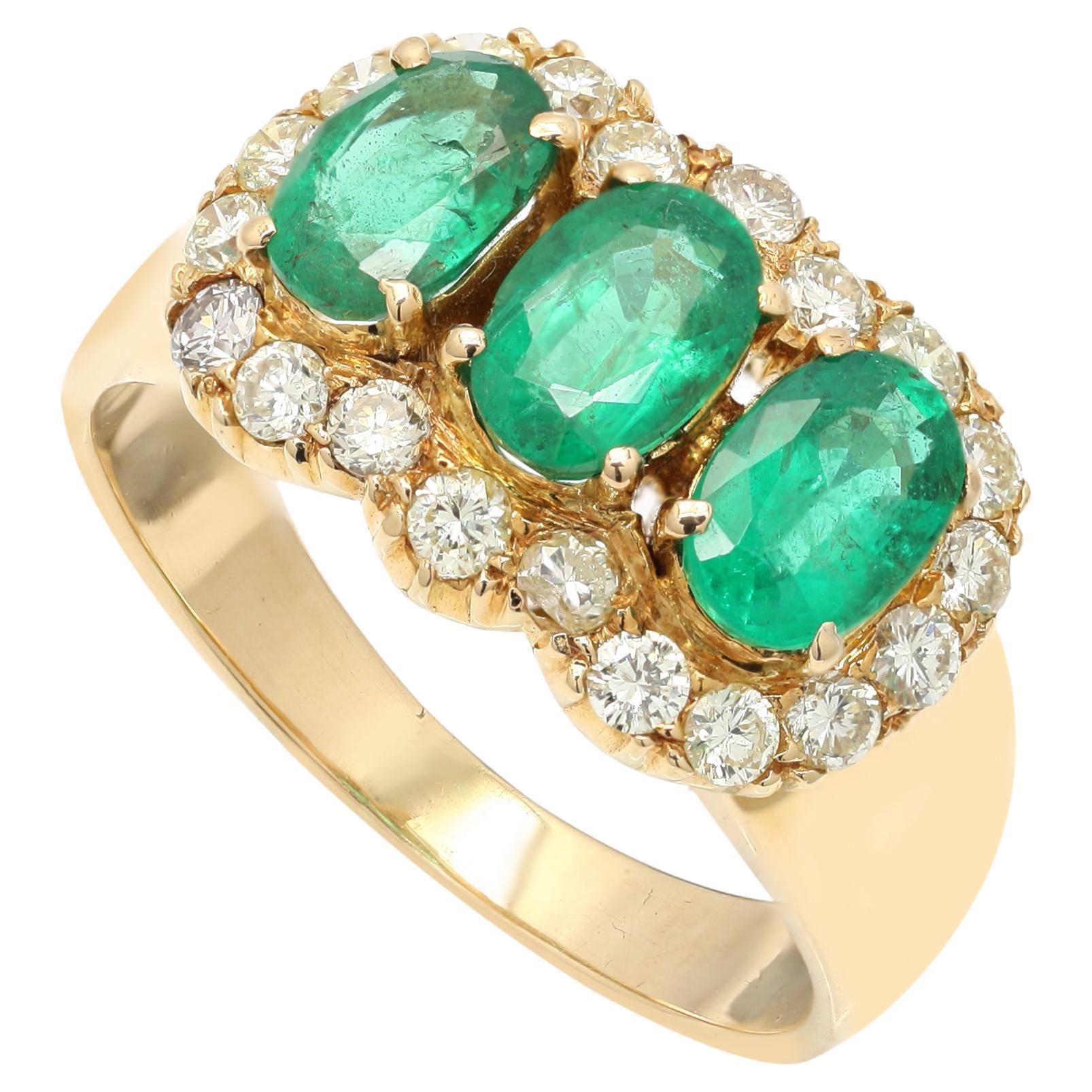 Estate 2.1 ct Oval Emerald Ring with Diamonds Encircling in 18 Karat Yellow Gold