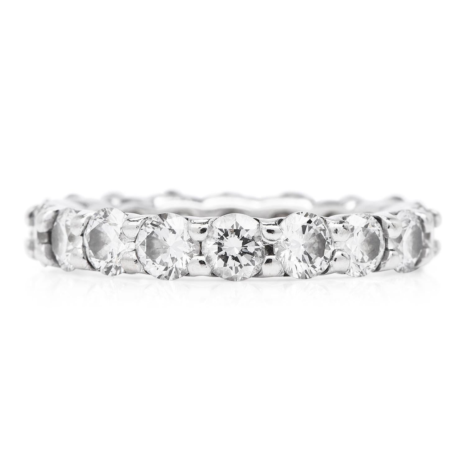 A classic endless design, representing ending love!

This ring is the perfect piece to match your engagement ring and an ideal complement to almost any attire.

 Exposing 18 genuine vivid diamonds, round cut, prong set, and approximately