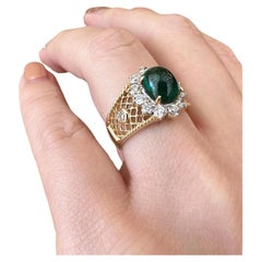 Estate 2.27 carat Emerald Cabochon with Diamond Halo in 18k Yellow Gold Estate 2.27 carat Emerald Cabochon with Diamond Halo in 18k Yellow Gold