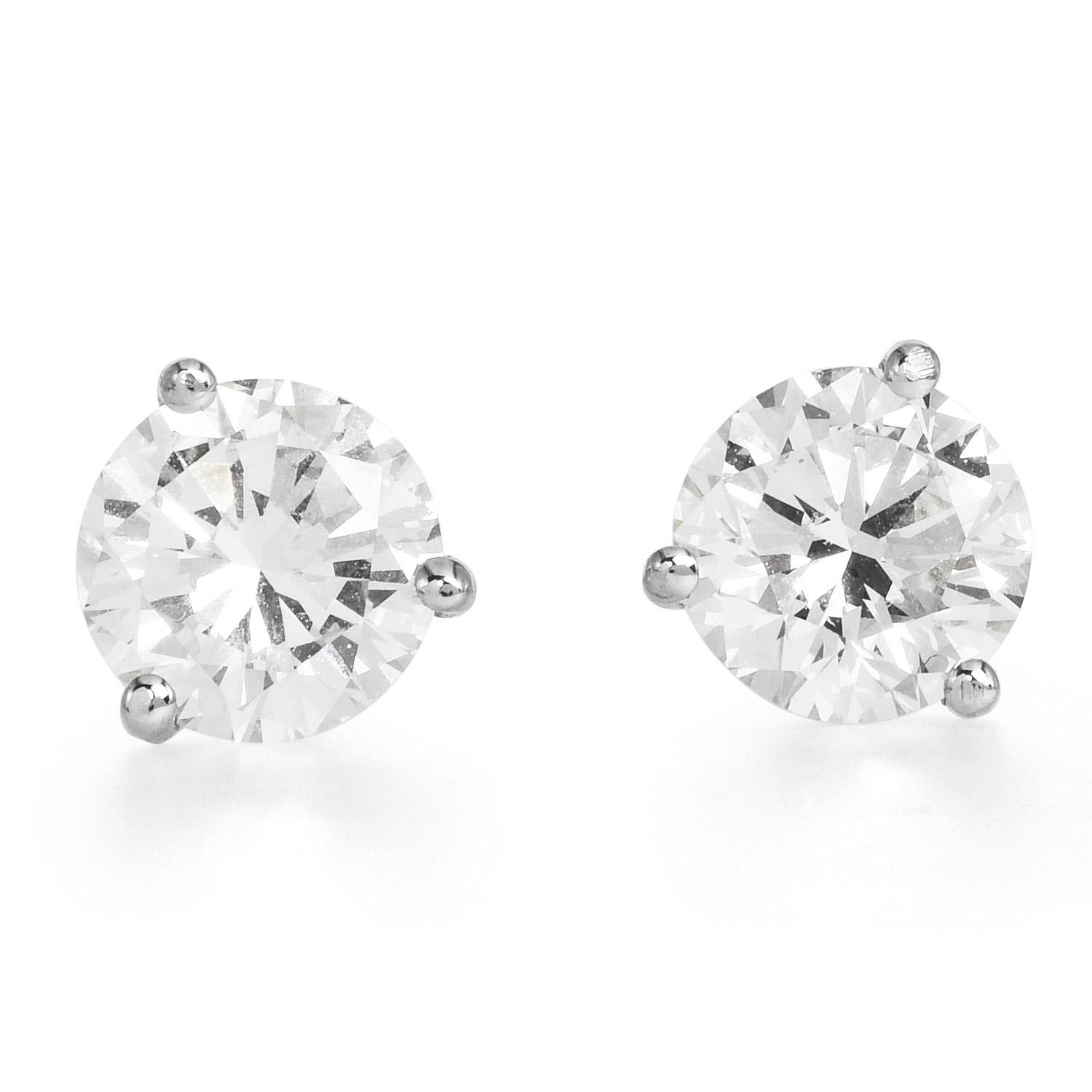 These classic martini diamond studs are a must-have for every diamond lover collection!

Set in a chick martini set tree prong style, crafted in 18K white gold

and contain 2 round faceted diamonds

weighing cumulatively appx. 2.45 carats and 

are