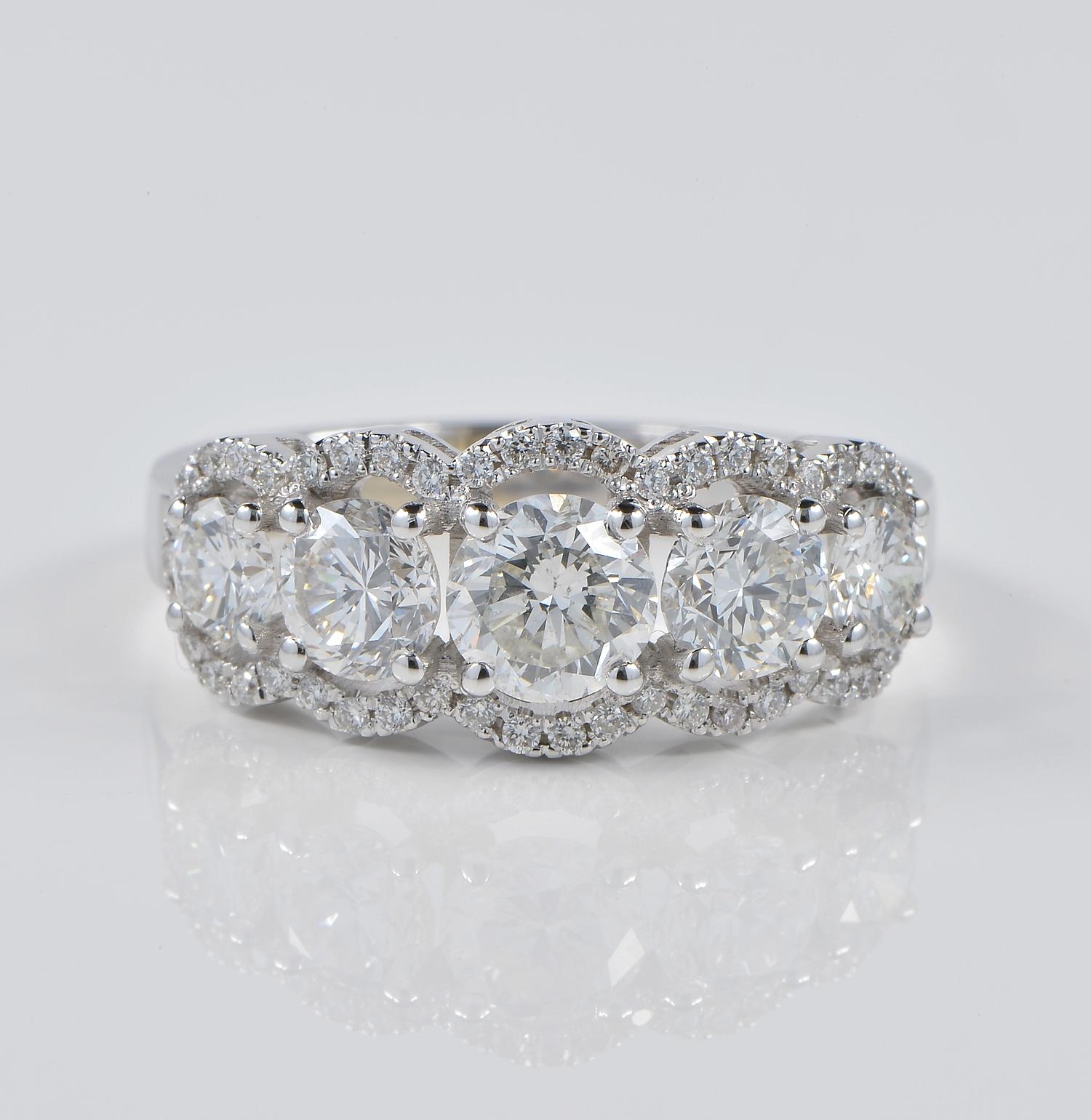 Beautiful example of classy Diamond five stone ring, Estate classy ring
Hand crafted as unique of solid 18 KT white gold
Distinctive 5 stone design expressed in a particular little Diamond frame for a more sophisticate look to the array of Diamond