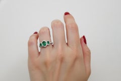 Estate 2.75 Carat Emerald 0.44 Carat Diamond Platinum Three Stone Ring