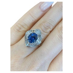 Estate 2.89 carat Oval Sapphire and Diamond Ring in Platinum