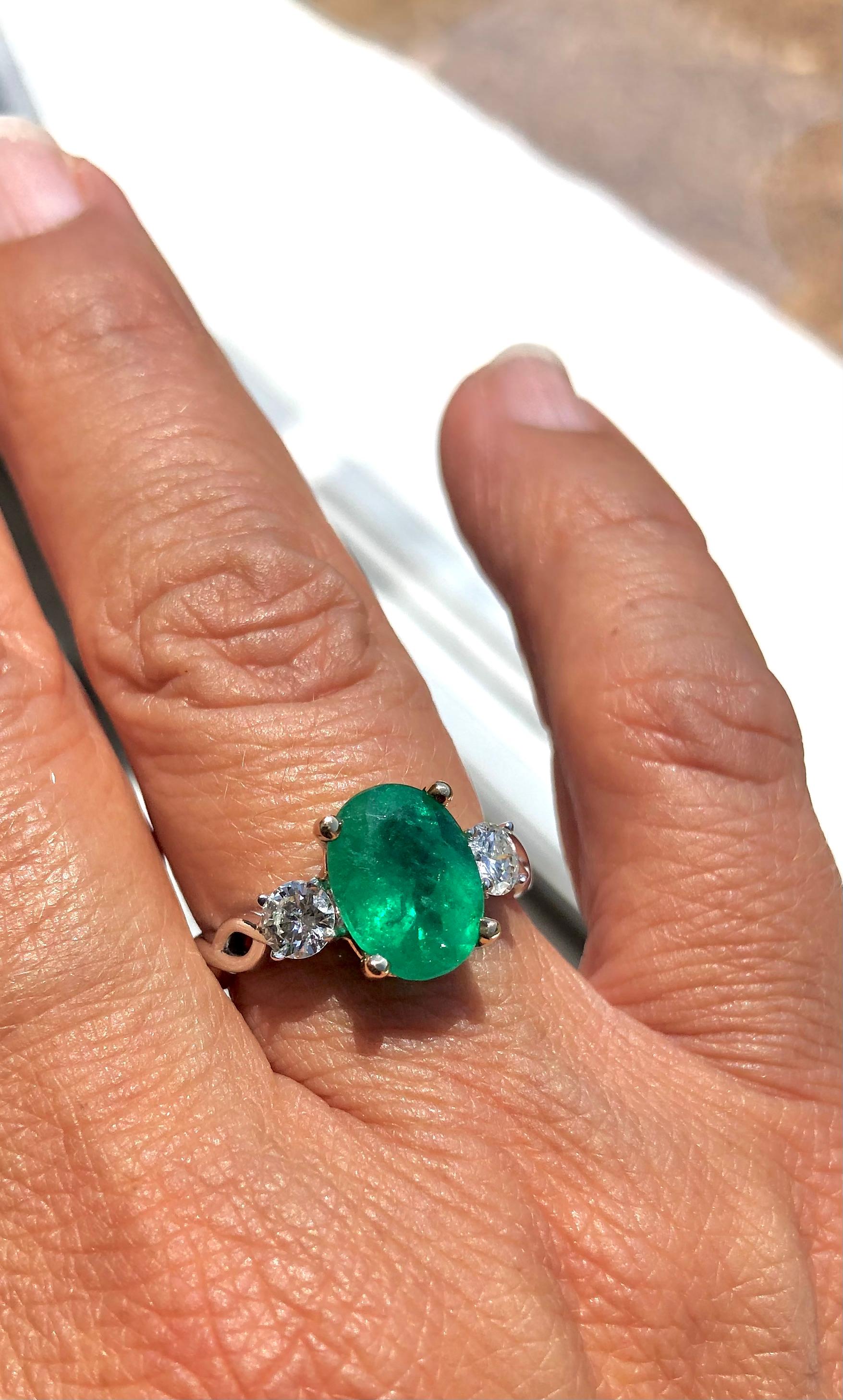Estate a Classic 3.30 Carat Natural Emerald and Diamond Engagement Ring Three-Stone  14K
Primary Stones: Natural Colombian Emerald
Shape or Cut: Oval Cut
Color/Clarity: Medium Green/ Clarity VS
Emerald Weight: Approx. 2.84 carats
Second Stone: