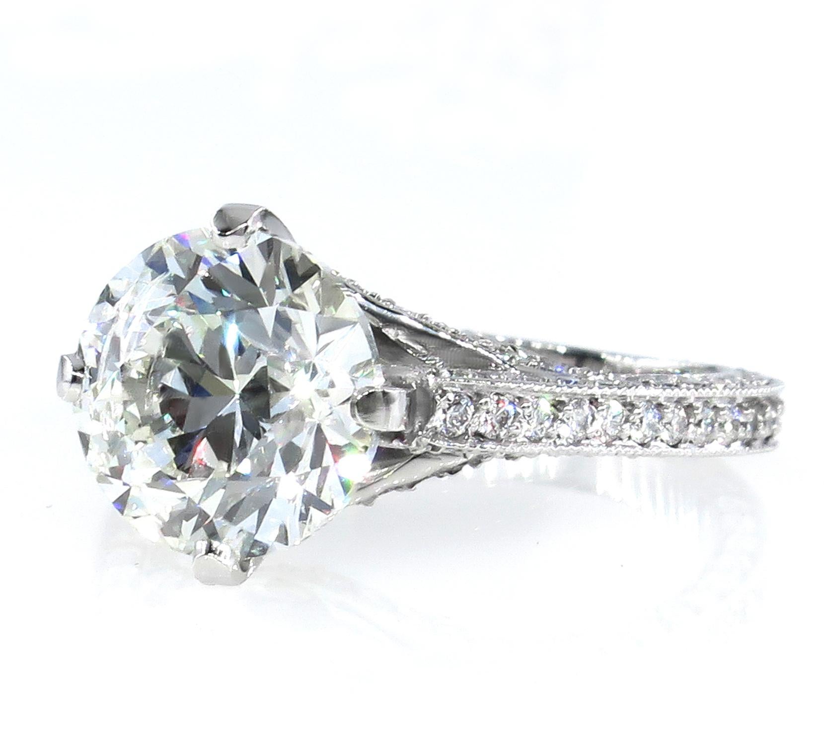 This is ring is just breathtaking and SUPER Fine and truly show stopper!
The center of attention in this dazzler is the Exquisite, Very Bright Round Brilliant cut 3.02ct Diamond in H color , SI3 clarity,accompanied by EGL USA certificate. SUPER
