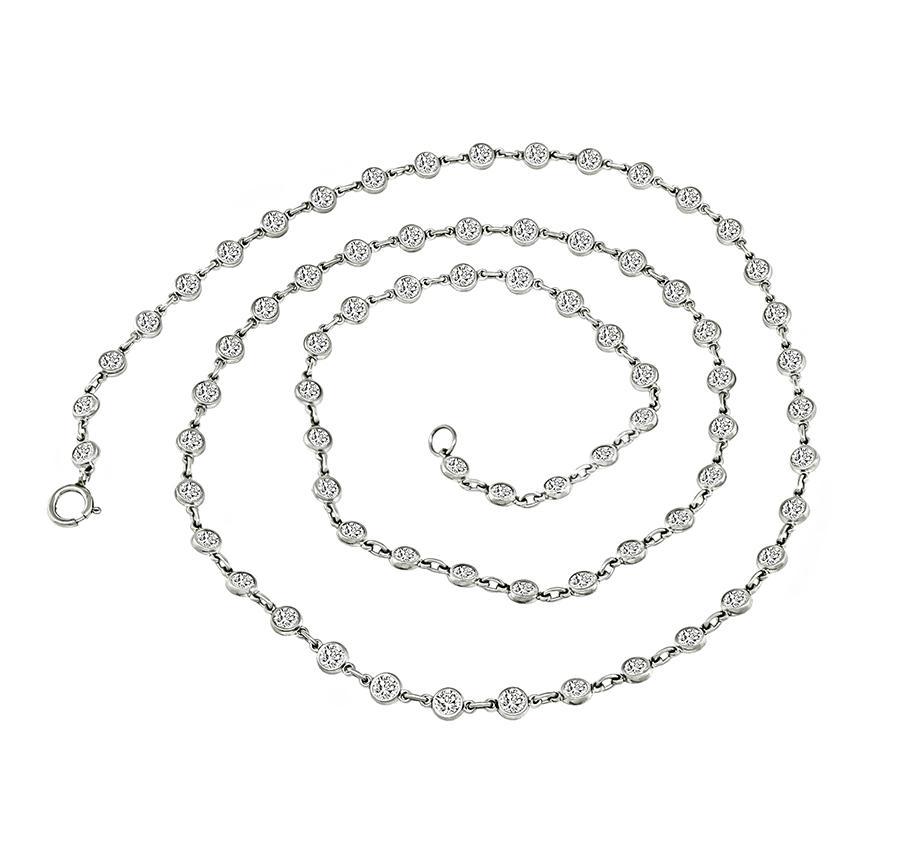 This is an elegant platinum by the yard necklace. The necklace is set with sparkling round cut diamonds that weigh approximately 4.64ct. The color of these diamonds is H with VS1 clarity. The necklace measures 3mm in width and 19 1/4 inches in