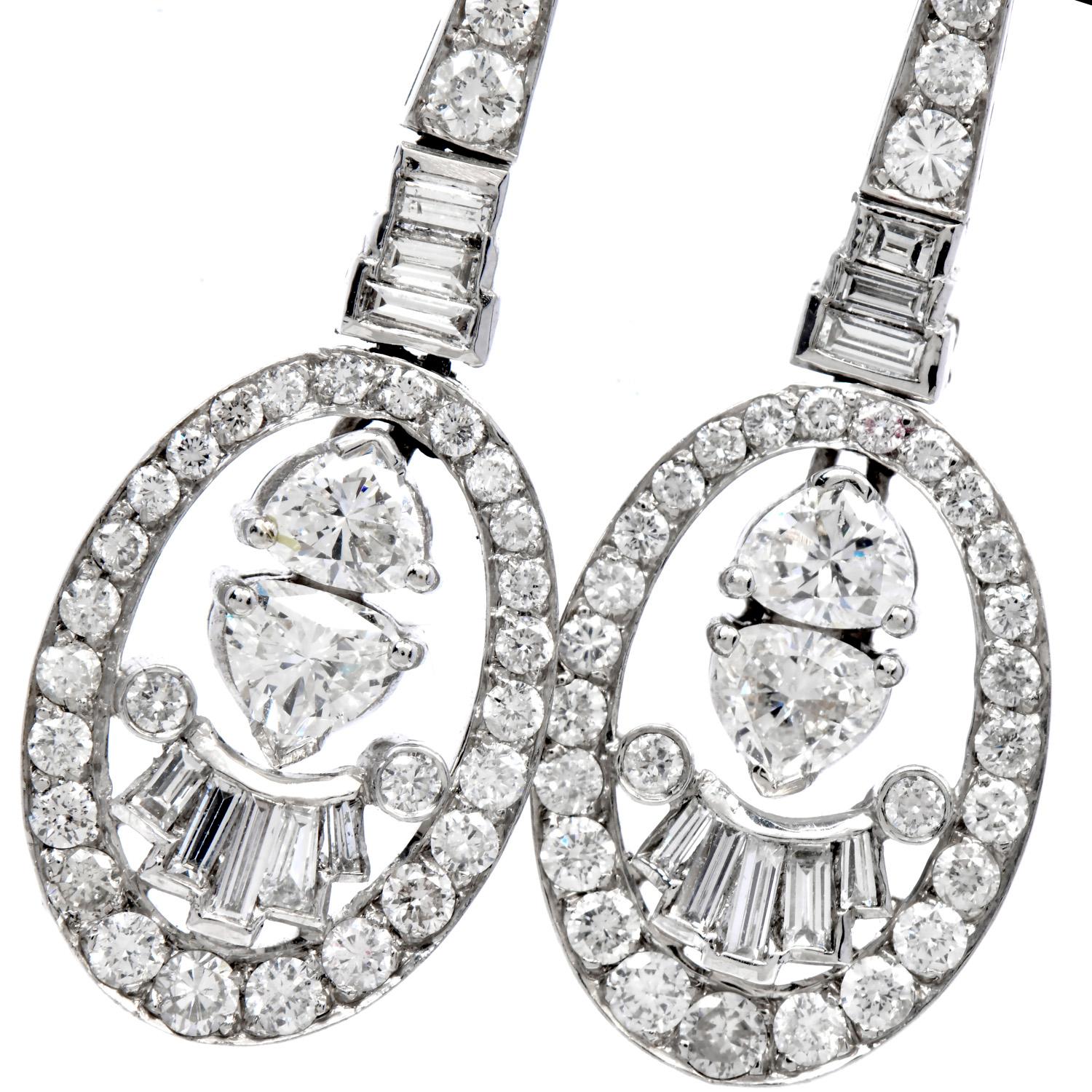 Elegance and movement on these Dangle Drop Earrings!
These 1990's pieces are centered by 4 Trillion-cut Genuine diamonds, the top is adorned by 2 Marquise-cut Genuine diamonds and 16 baguette-cut  Prong Set and Chanel set, weighing 3.00 carats in