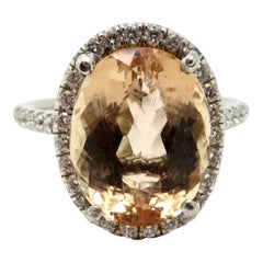 Vintage Estate 6.25 Carat Oval Imperial Topaz and Diamond Halo Fashion Ring