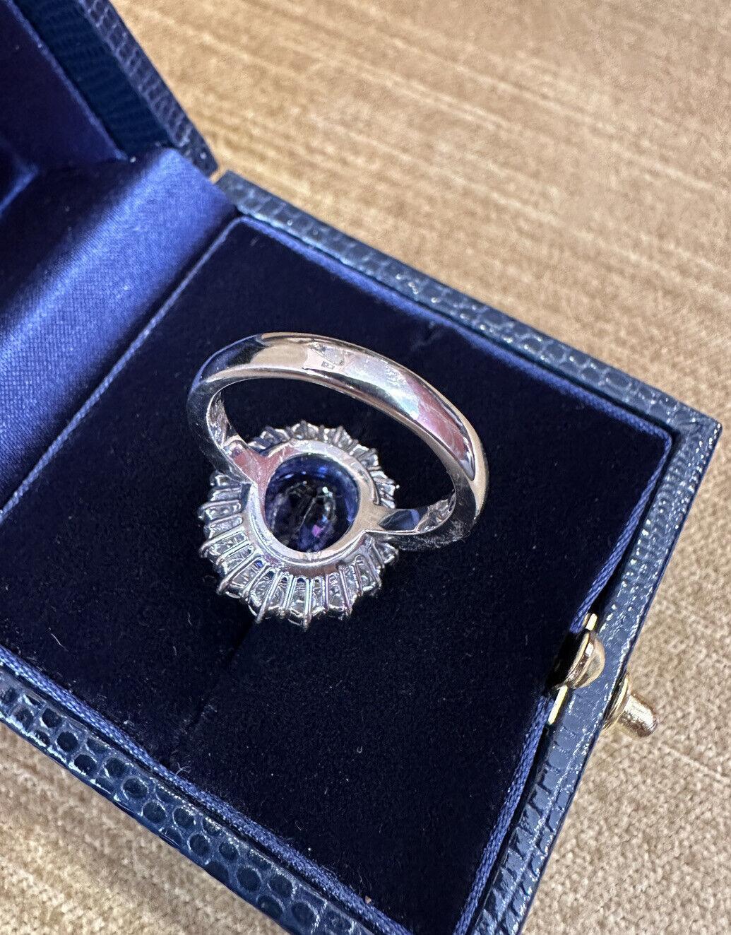 Nachlass 6,63 Karat ovaler Tansanit Ring mit Halo-Diamant in Platin im Zustand „Hervorragend“ im Angebot in La Jolla, CA
