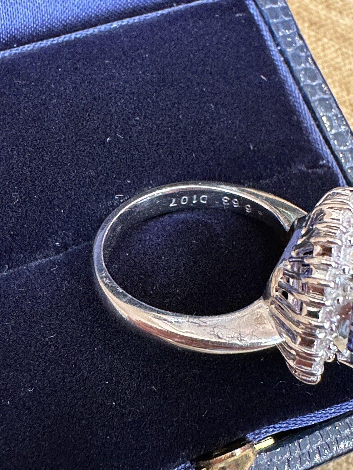 Nachlass 6,63 Karat ovaler Tansanit Ring mit Halo-Diamant in Platin Damen im Angebot
