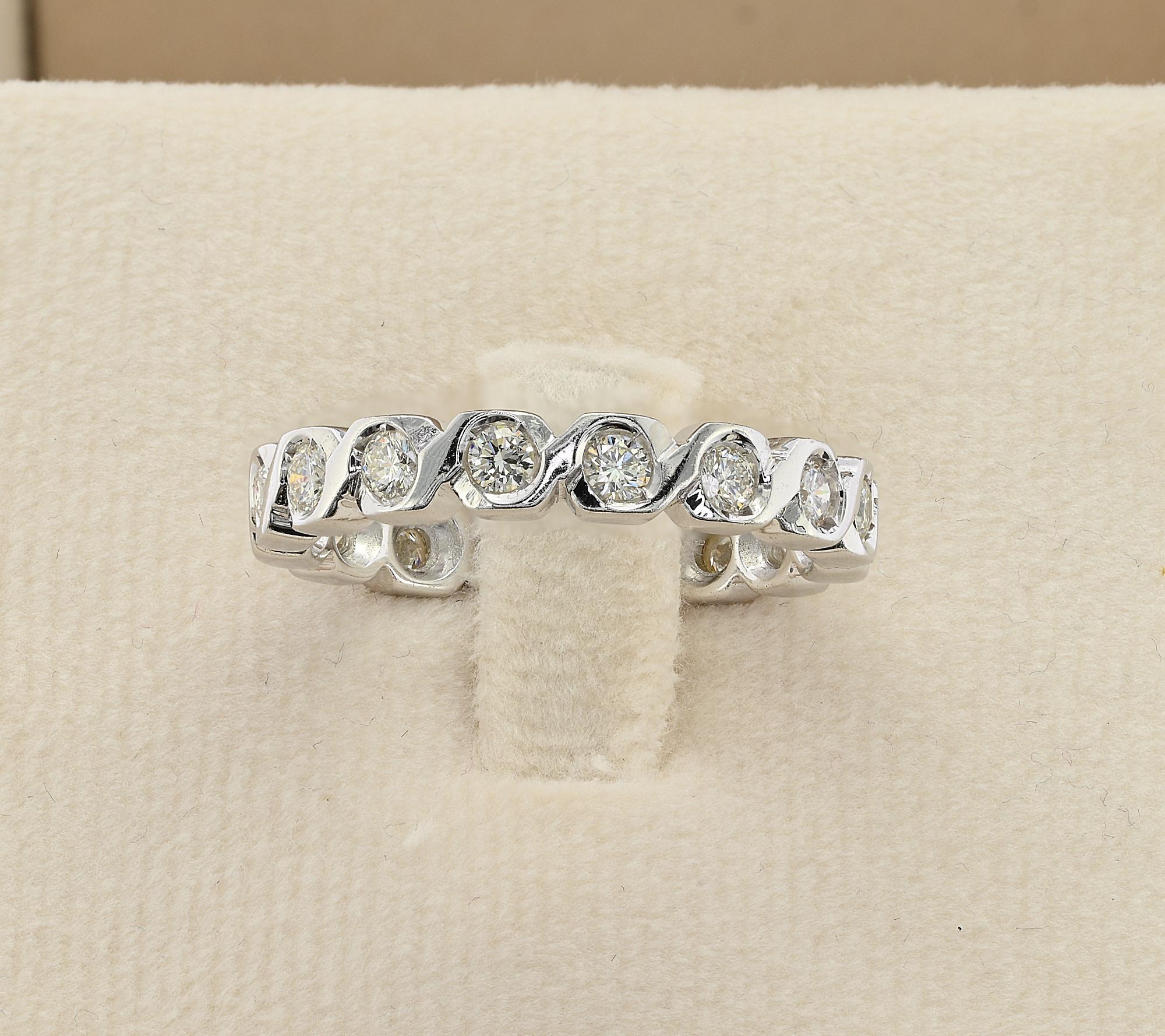 Estate beautiful eternity ring hand crafted of solid 18 KT gold Italian stamps – 1980 circa
Round eight shaped setting hosting a selection of 16 bright white brilliant cut Diamonds rated F/G VS totaling .80 carats projecting great sparkle
