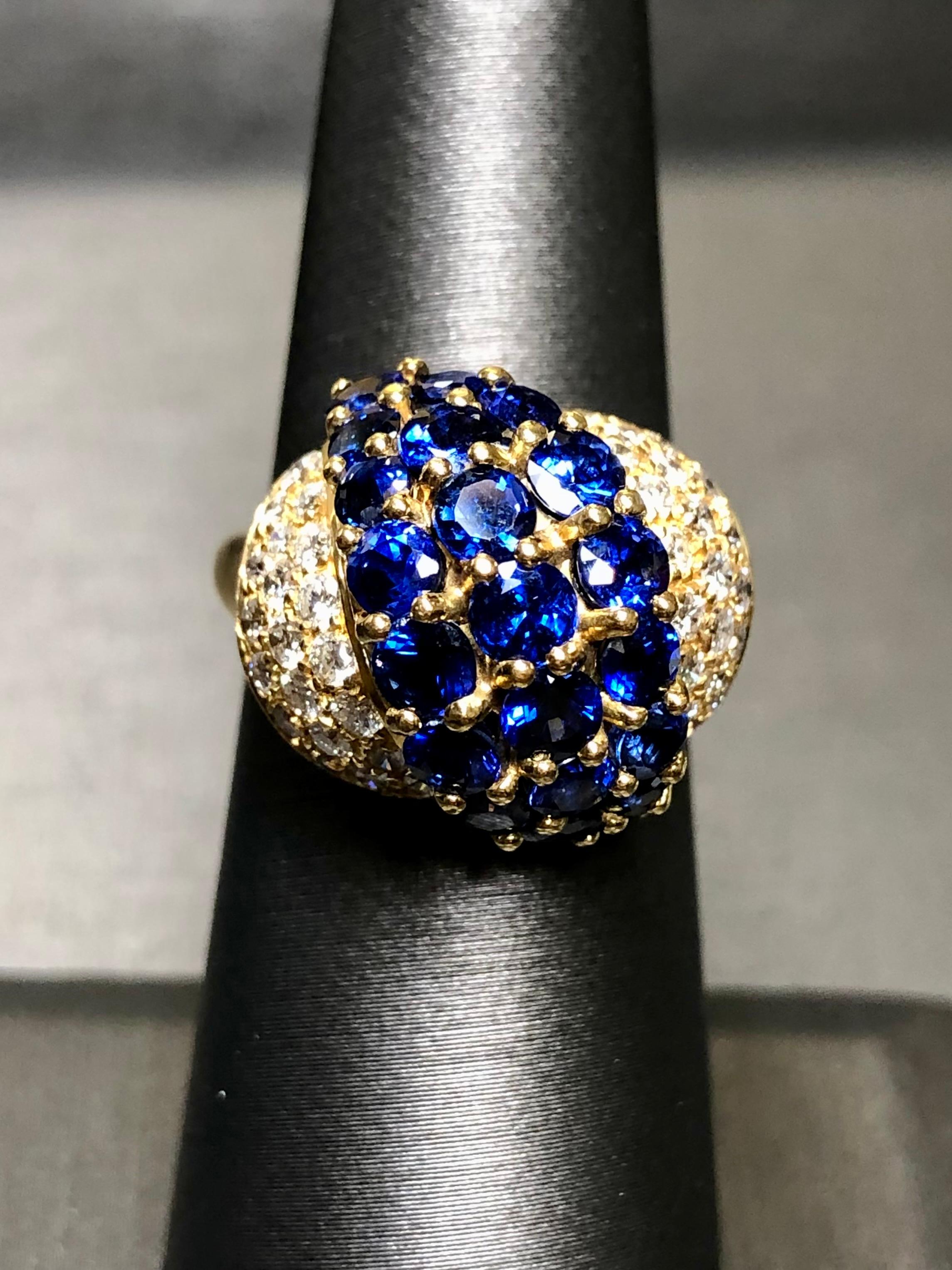 
A bright and vibrant cocktail ring done in 18K yellow gold and prong set with approximately 4cttw in gorgeously blue natural sapphires as well as 1.44cttw in F-G color Vs1-2 clarity diamonds. By Italian maker, AIMETTI.


Dimensions/Weight:

Ring