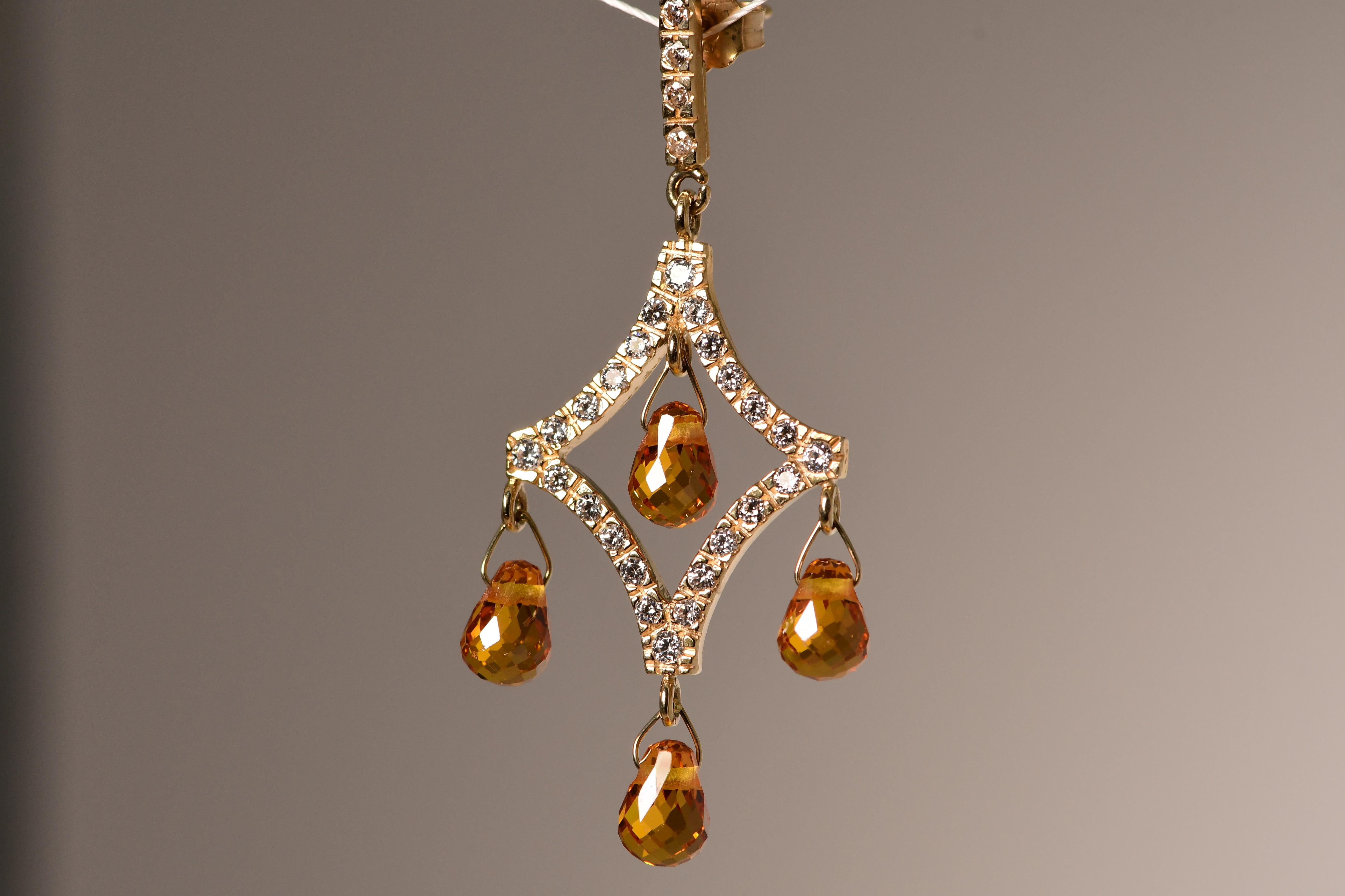 Estate Amber color Glass & CZ Yellow Gold Pear shape Dangle Drop Earrings

Main Stone: Amber Color Glass
Stone Shape: Pear shape
Secondary Stone: Cubic Zirconia
Metal: Yellow Gold
Metal Purity: 14k
Total Gram Weight: 9
Fastening:
Butterfly
Earrings