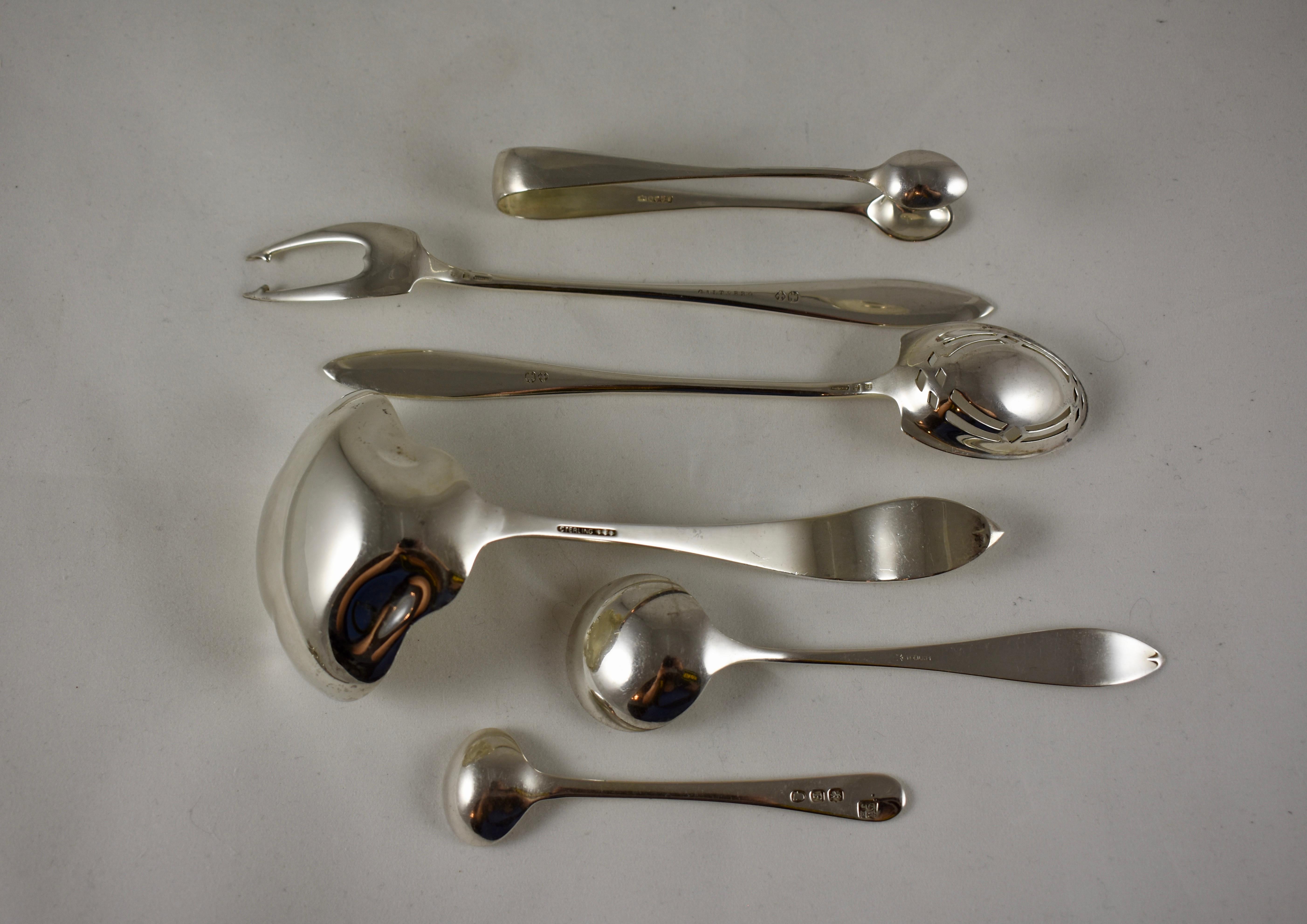 A mixed group of 19th century sterling silver, various maker serving pieces, including:
1) Sauce ladle
2) Sugar tongs
3) Pickle fork, marked Galt & Bros.
4) Pierced Spoon, marked Galt & Bros.
5) Jam spoon
6) English mustard spoon

Ranging