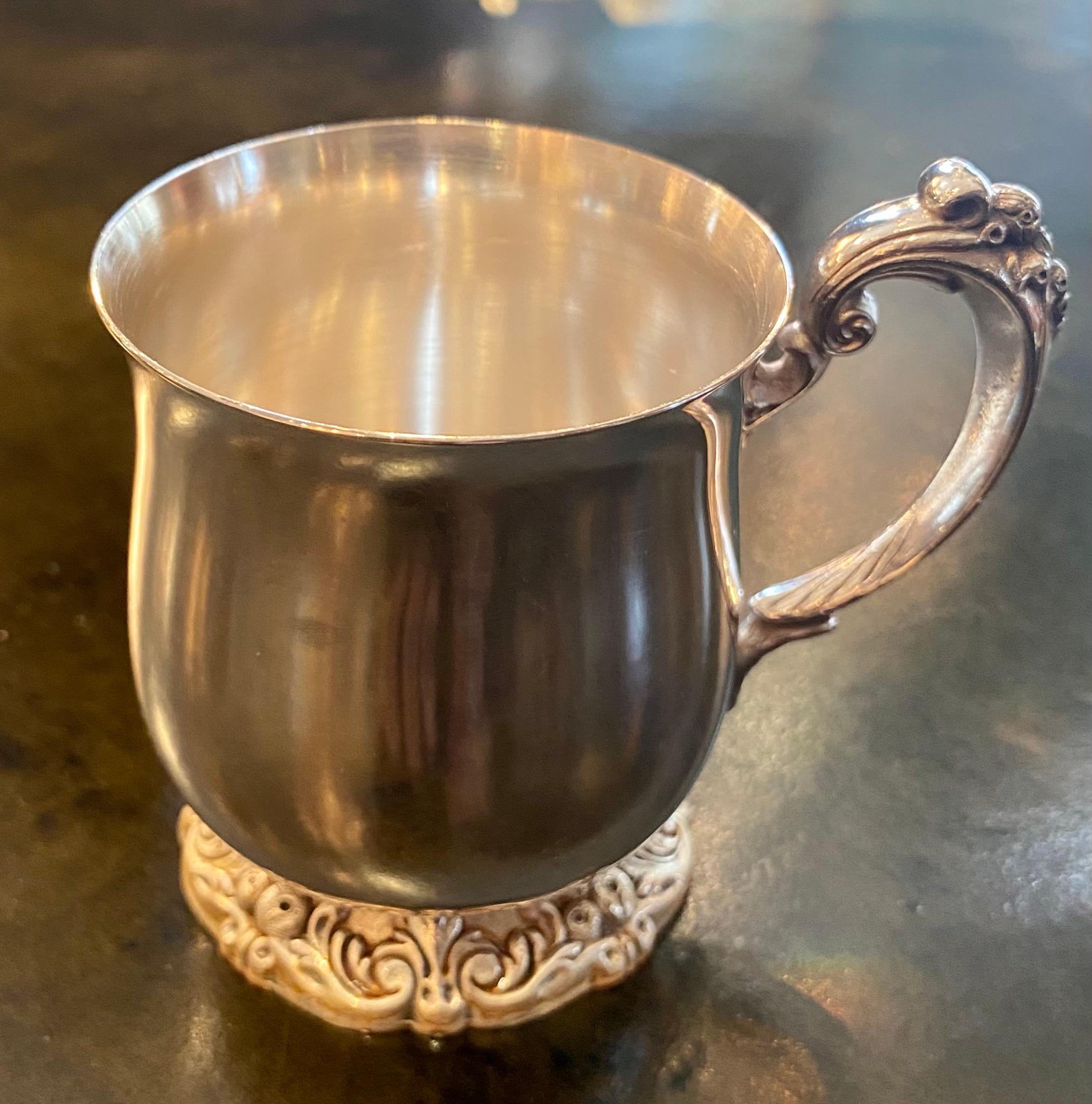 silver punch bowl with cups