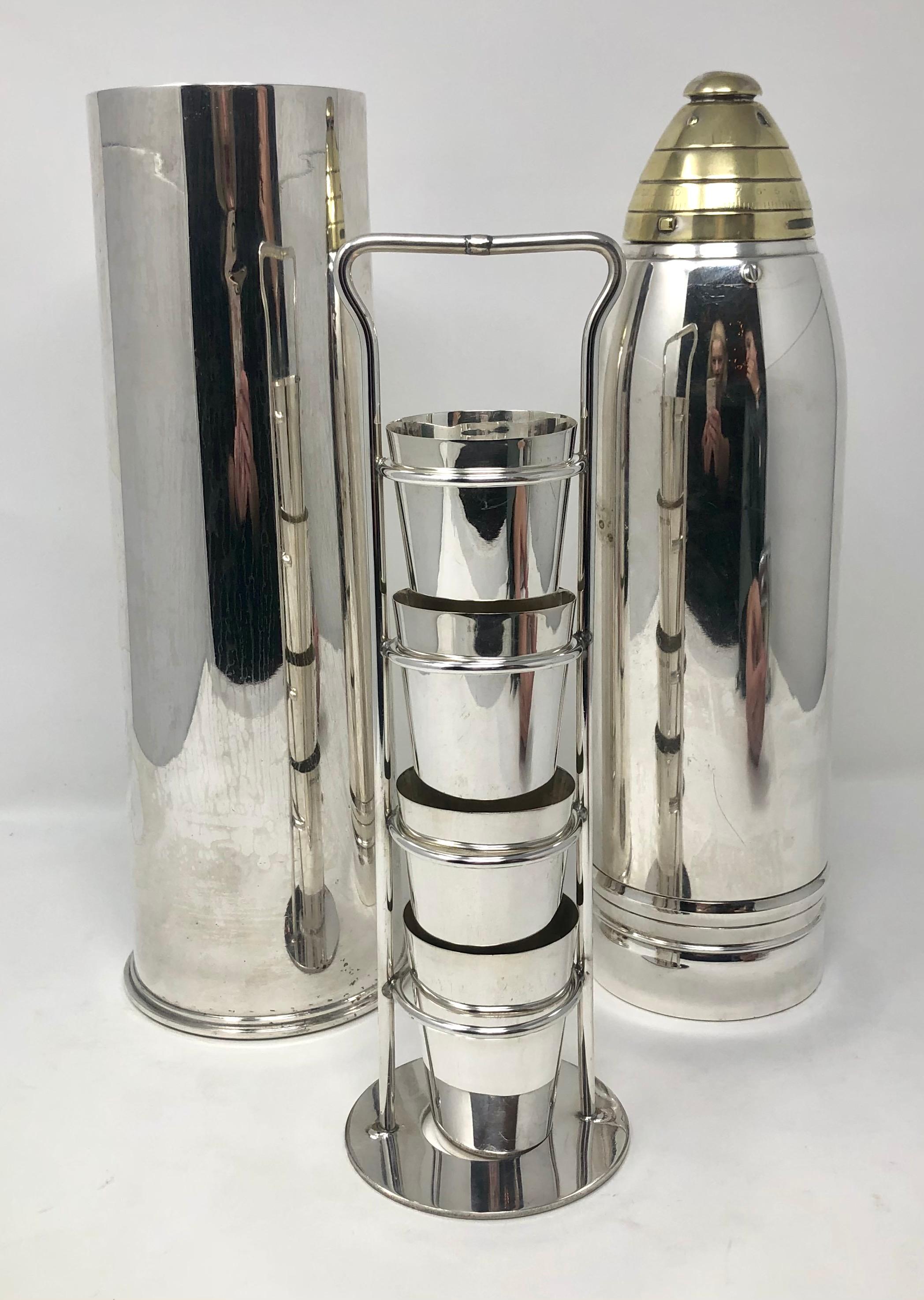 Rare state American silver plated artillery shell cocktail shaker with glasses, 1920s-1930s.