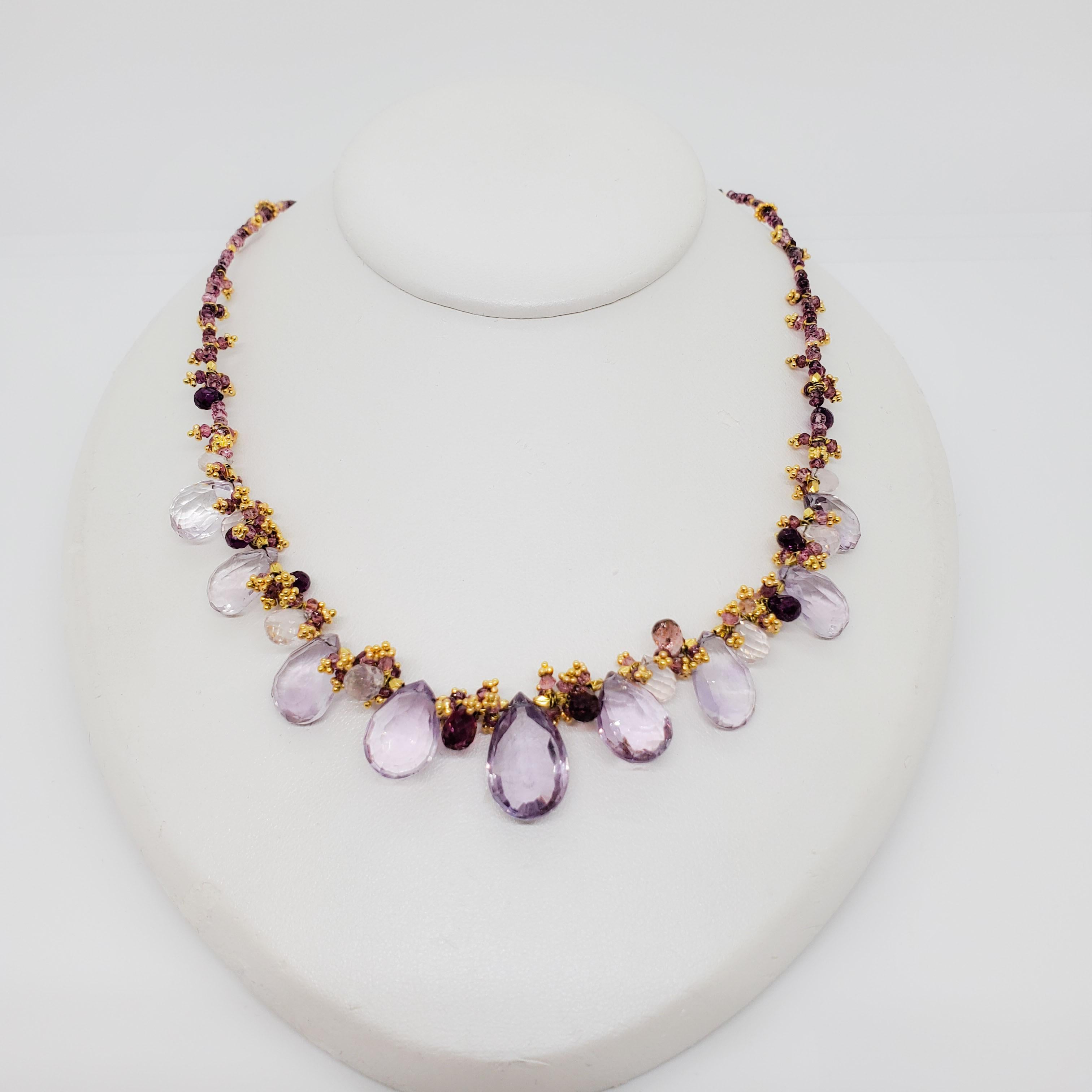 Beautiful amethyst multi shape necklace in 18k yellow gold.  Length is 16
