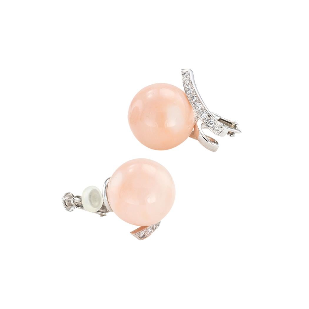 Angel skin coral, diamond, and white gold clip-on earrings circa 1990.

Clear and concise information you want to know is listed below.  Contact us right away if you have additional questions. 

We are here to connect you with beautiful and
