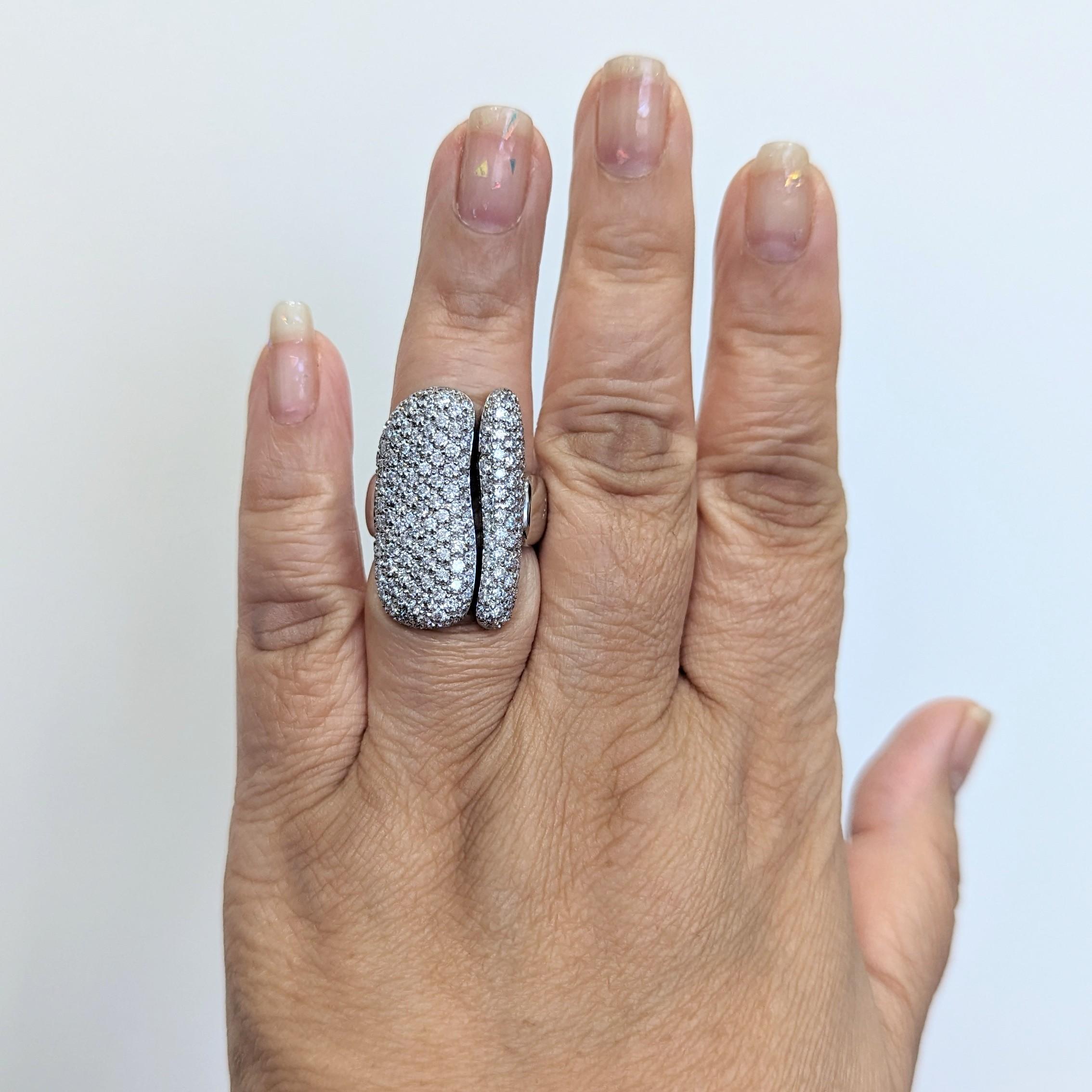 Beautiful 3.00 ct. good quality, white, and bright diamond rounds in this pave design estate Antonini ring.  Handmade in 18k white gold.  Ring size 7.25.