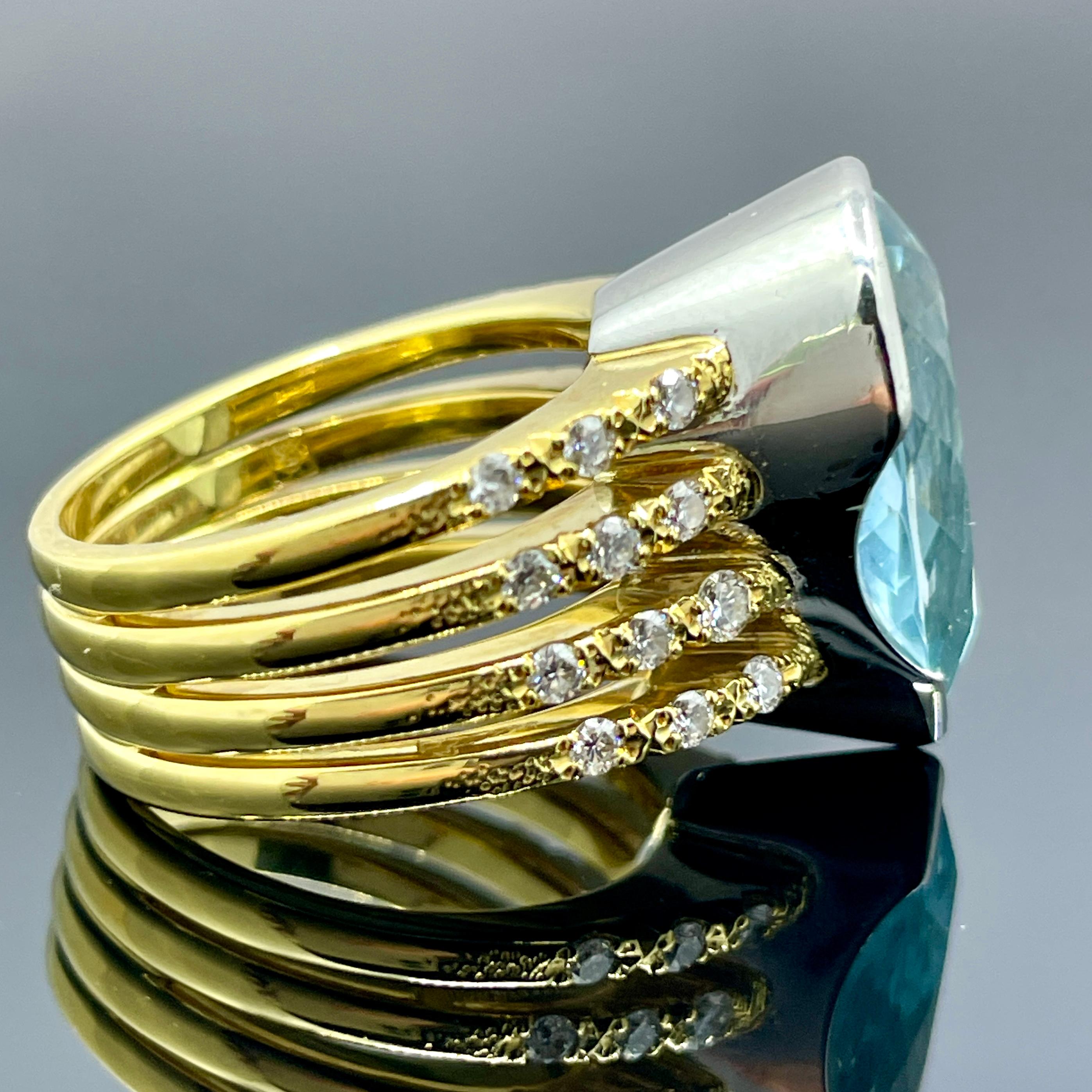 Anello personalizzato con acquamarina e diamanti in platino e oro 18 carati - Acquamarina da 7,73 carati

Questo anello di proprietà personalizzato, audace e ben realizzato, è incentrato su un'acquamarina naturale a forma di pera da 7,73 carati,