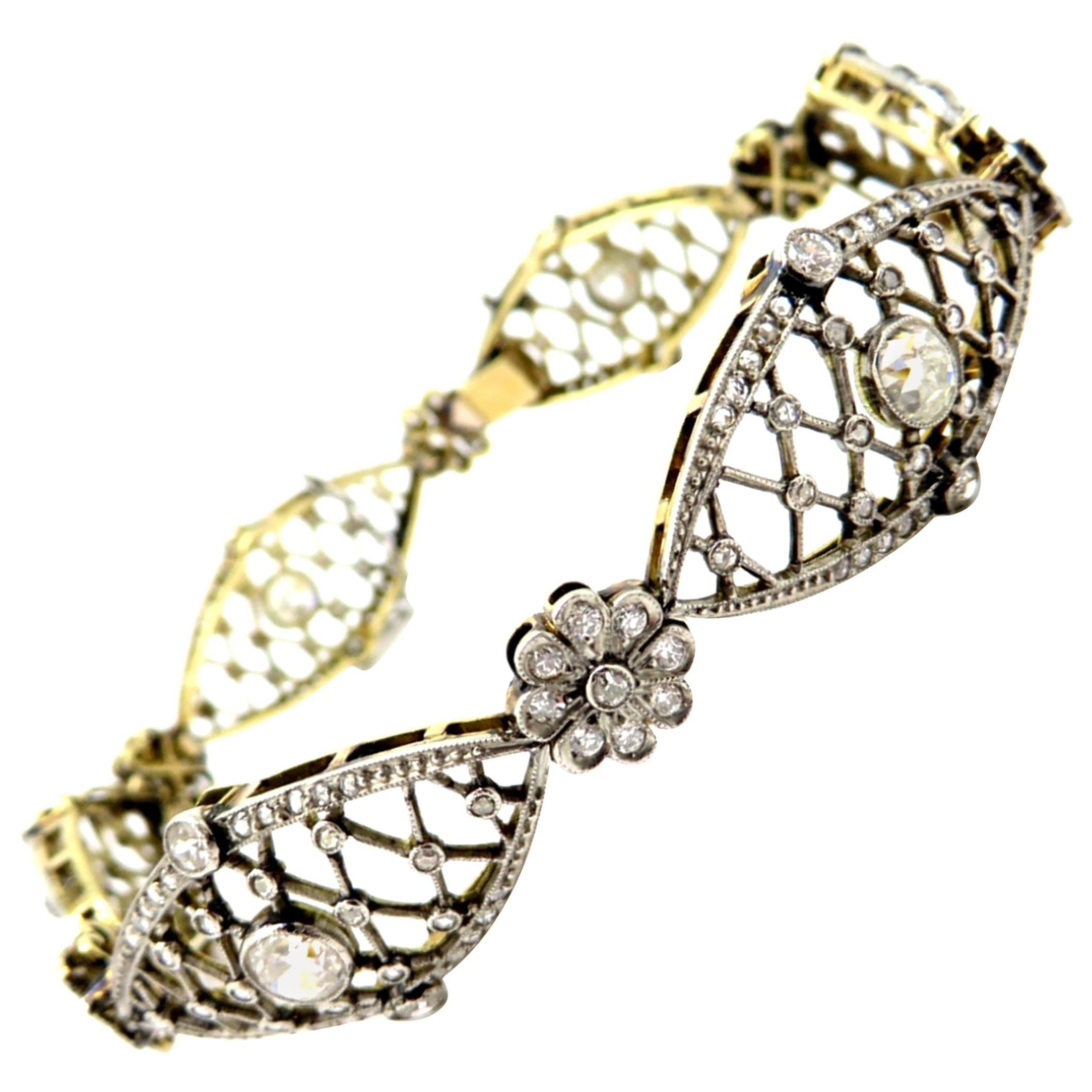 Bracelet tennis Art déco à fleurs en platine et or 18 carats et diamants (succession) en vente