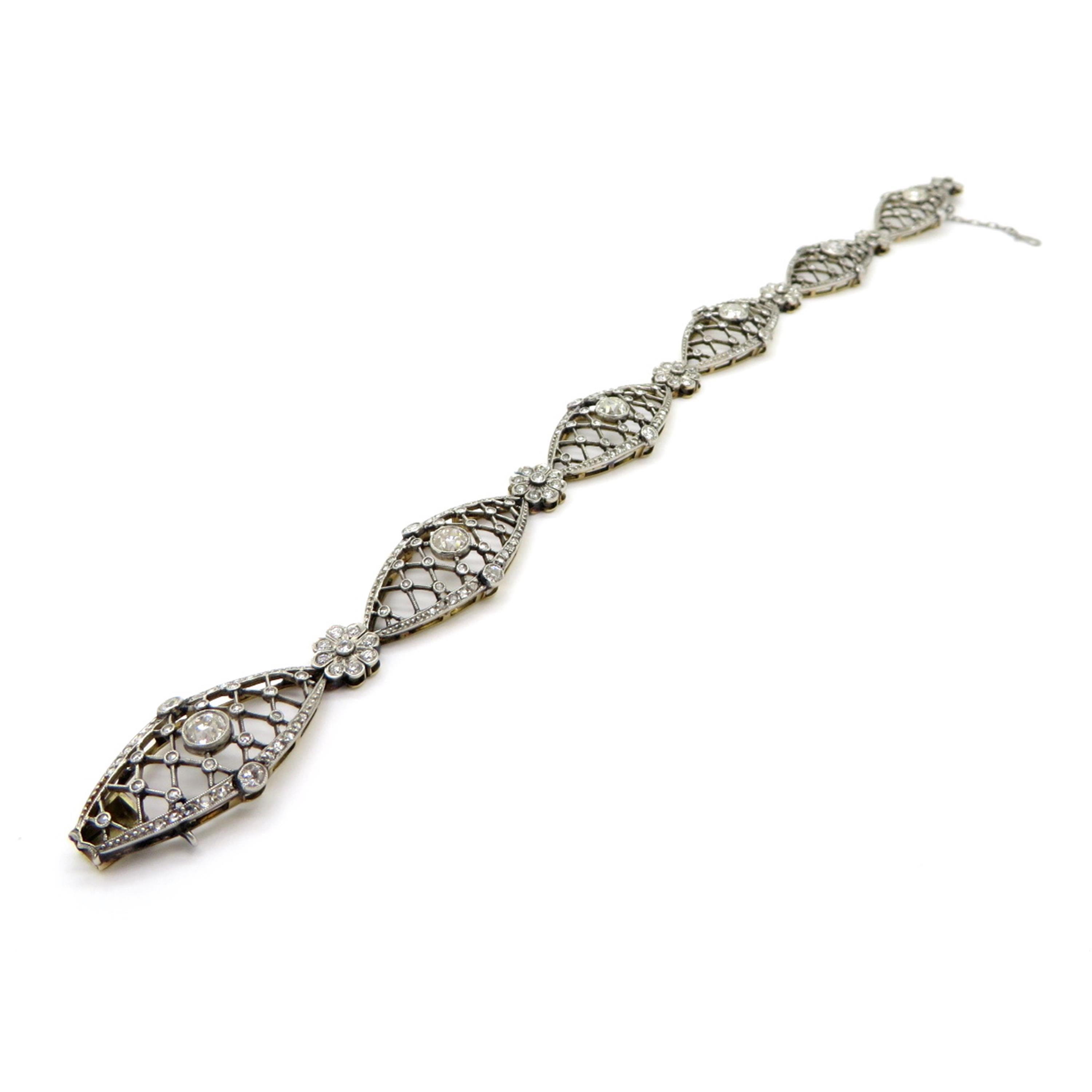 Taille vieille Europe Bracelet tennis Art déco à fleurs en platine et or 18 carats et diamants (succession) en vente