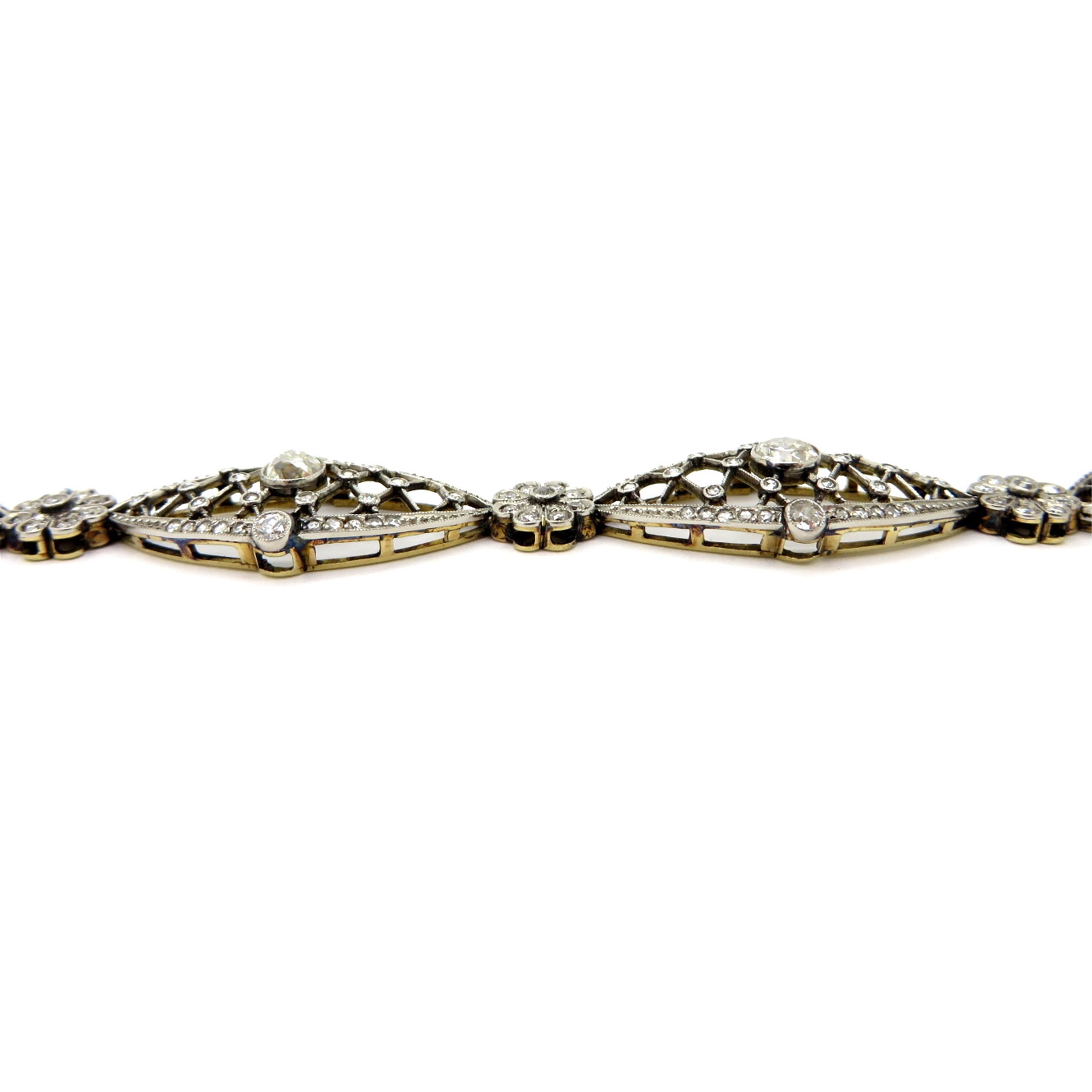 Bracelet tennis Art déco à fleurs en platine et or 18 carats et diamants (succession) Excellent état - En vente à Scottsdale, AZ