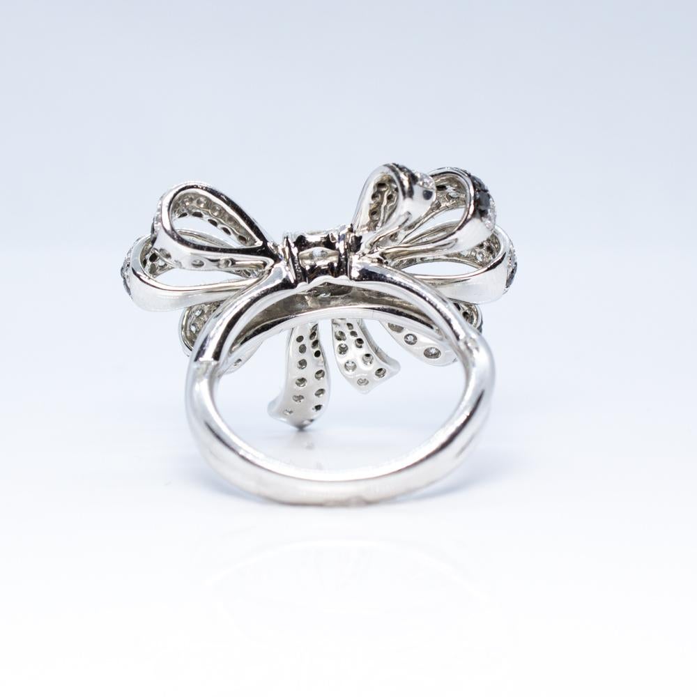Women's Estate Art Deco Style 18 Karat White Gold Black and White Diamond Bow Ring For Sale