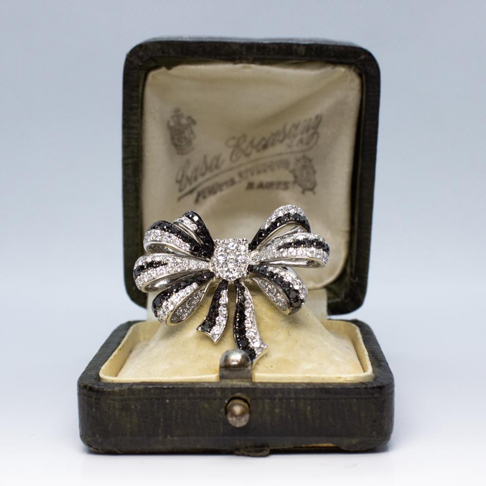 Estate Art Deco Style 18 Karat White Gold Black and White Diamond Bow Ring For Sale 2