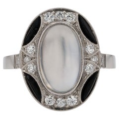 Bague cocktail de style Art déco en pierre de lune, onyx et diamants