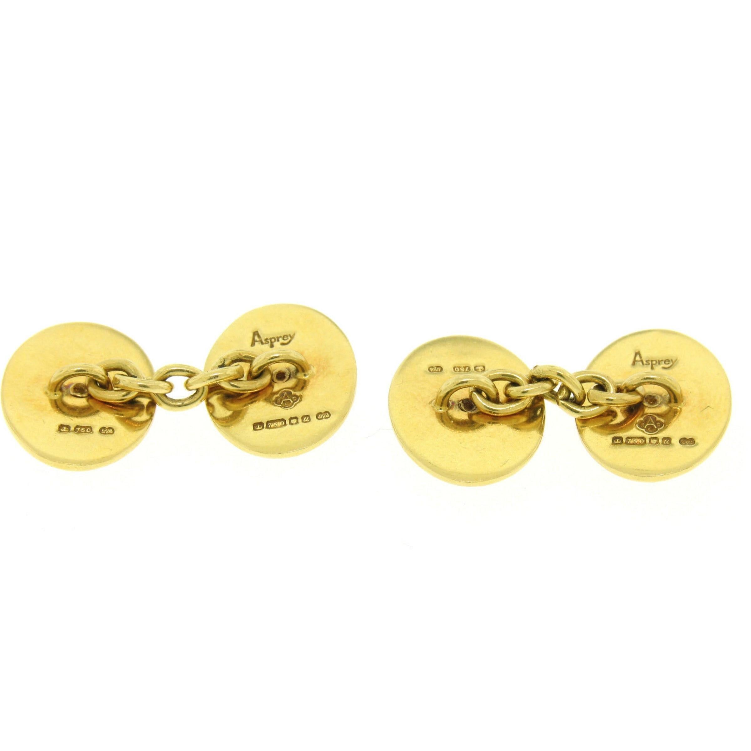 Guaranteed 100% authentic Asprey cuff links - very collectible. Enjoy!


-- Item Details --

Material:   18K Solid Yellow Gold
Weight:  17.20 Grams 
Design: Gold star centers with white and dark red enamel stripes.
Dimensions/Size:   The face of