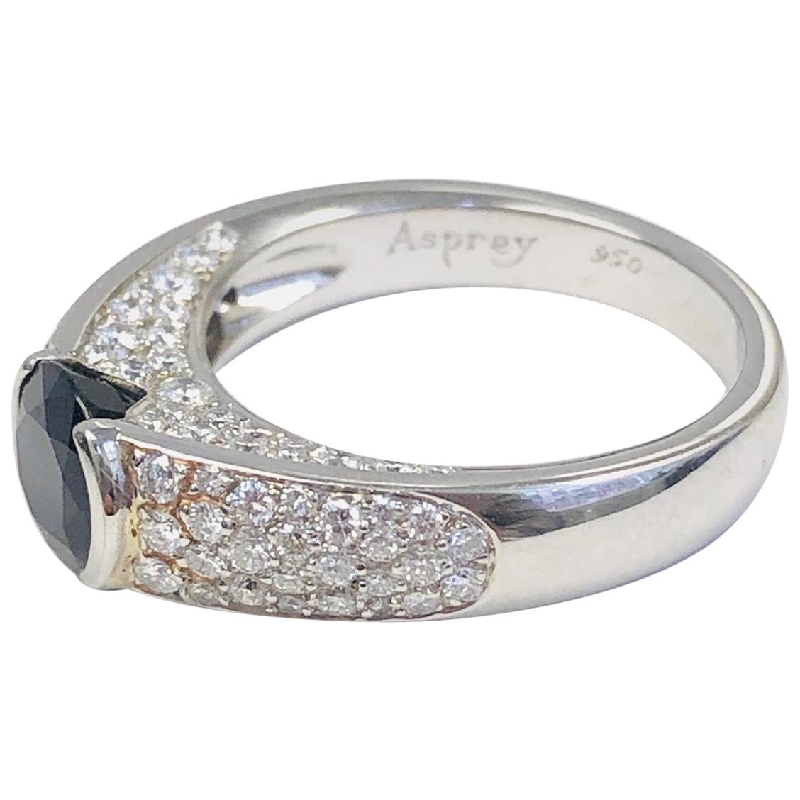 Estate "Asprey" Platinum Diamond and 1.38 Carat Sapphire Ring For Sale