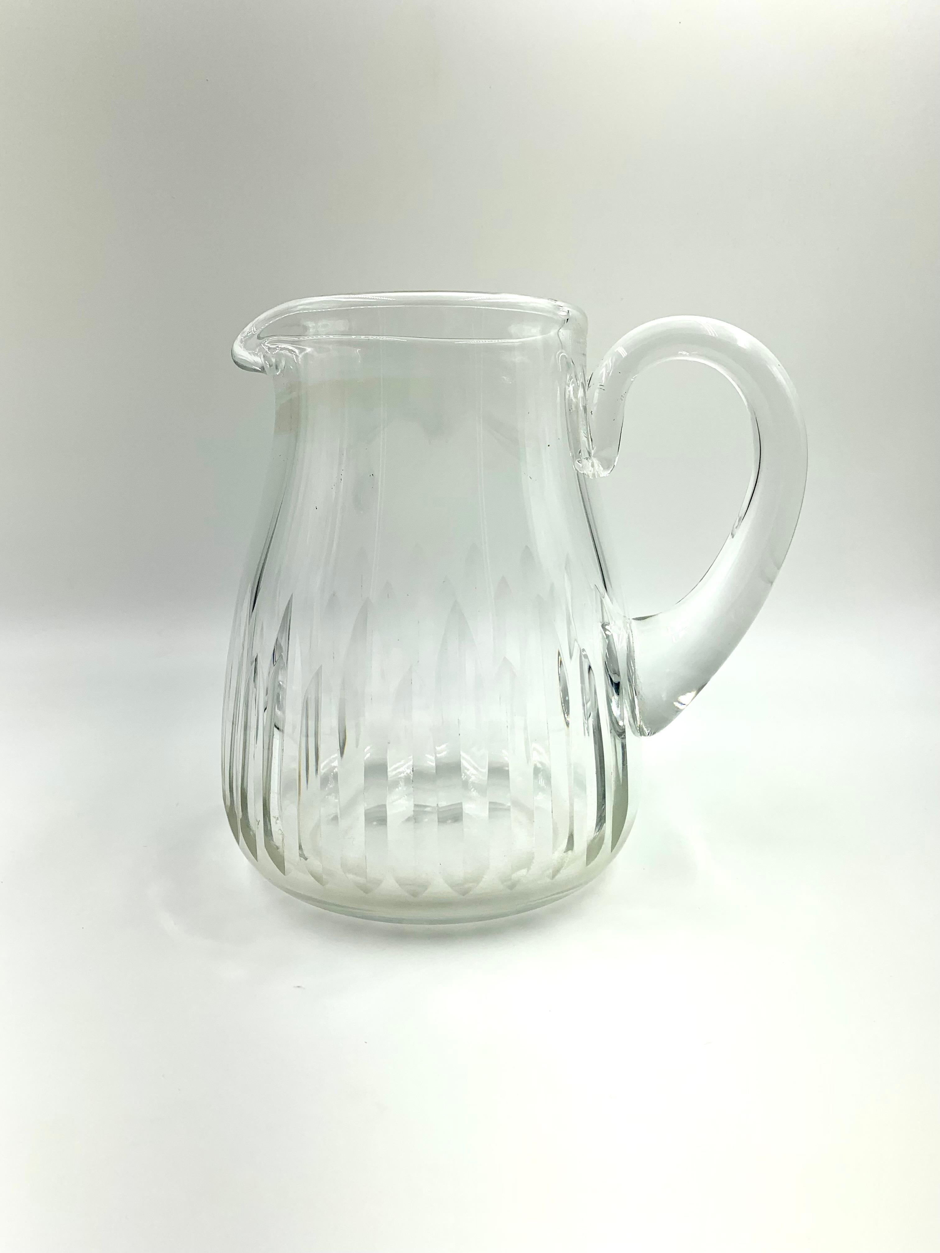 Estate Baccarat Lorraine pattern crystal cocktail/water pitcher
Scarce pattern, out of production
Substantial, heavy crystal with hand faceted design
Condition: Good, light surface wear at the base and interior
Marks: Baccarat circular signature at