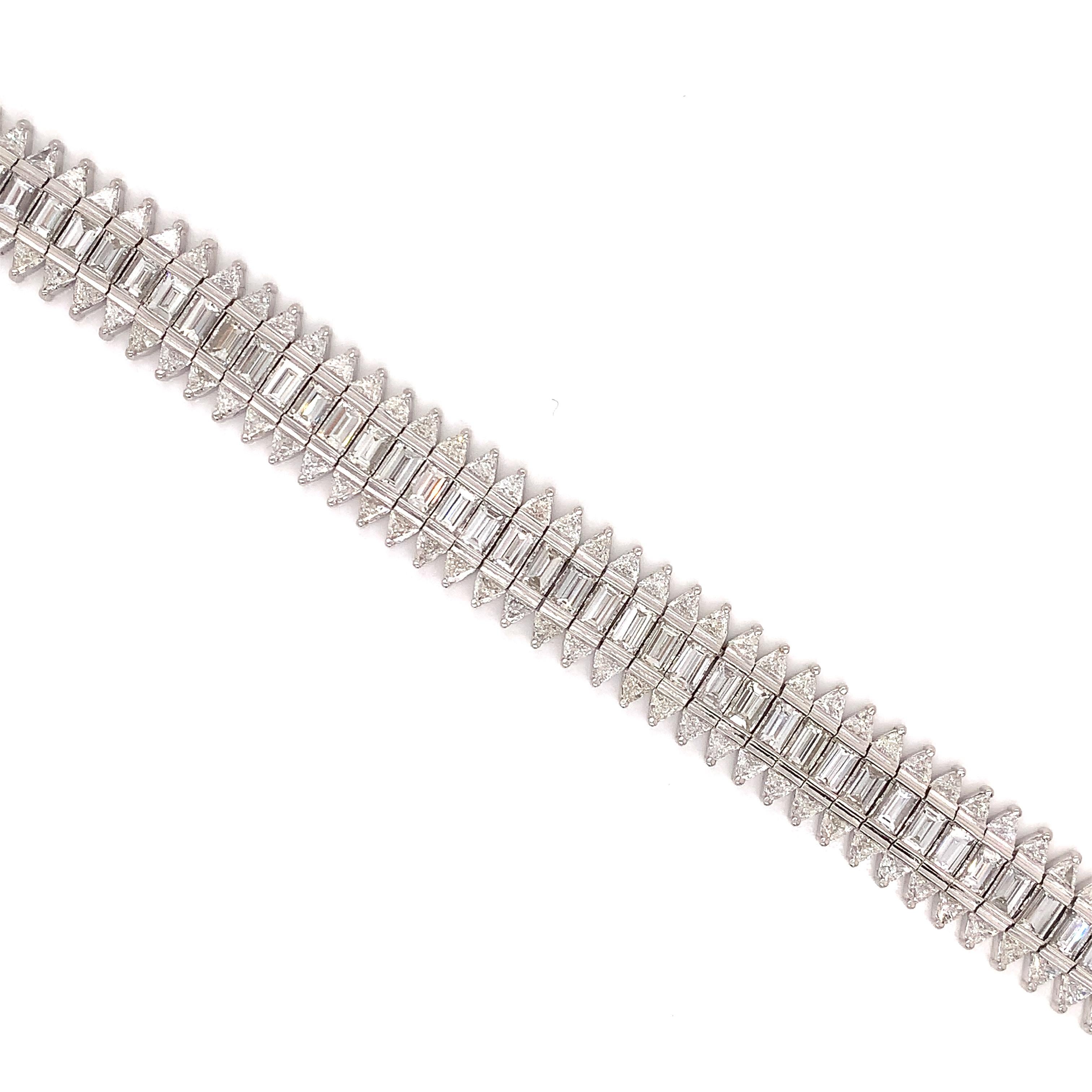 The ultimate baguette and trillion diamond tennis bracelet!  You can't miss the sparkle from a total of 15.5 cttw in two diamond shapes.  There are 116 trillions totaling 5 cttw with E-F color and VVS2-VS1 clarity.  There are an additional 58