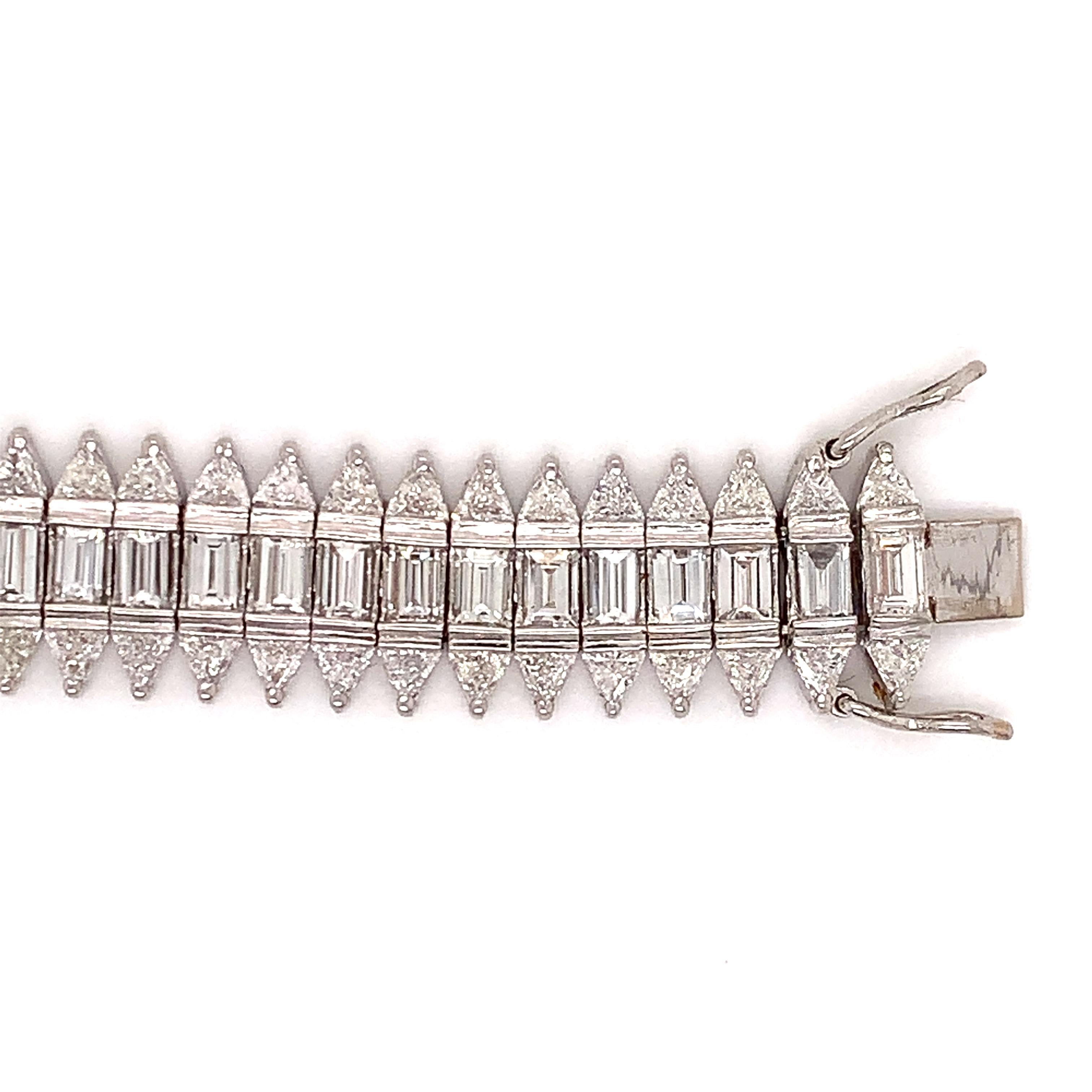 Estate Baguette and Trillion 10.5 cttw Diamond Tennis Bracelet In Good Condition In Derby, NY