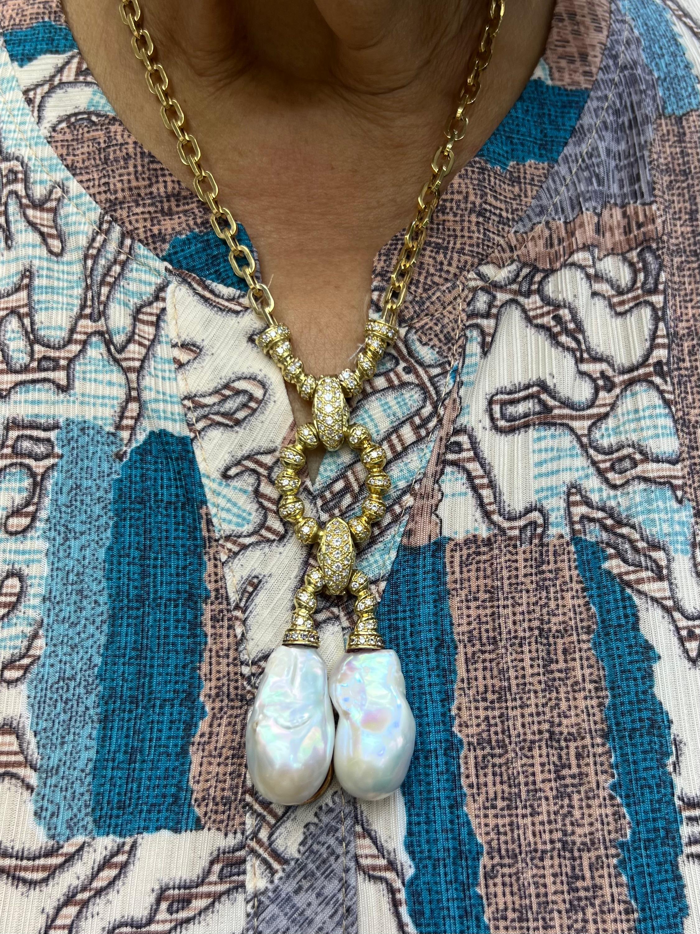 Estate large Biwa Pearl Diamond yellow gold necklace, circa 1980s.

The Estate Large Biwa Pearl Diamond Yellow Gold Necklace, dating back to the 1980s, represents a significant intersection of luxury and craftsmanship in jewelry design during that