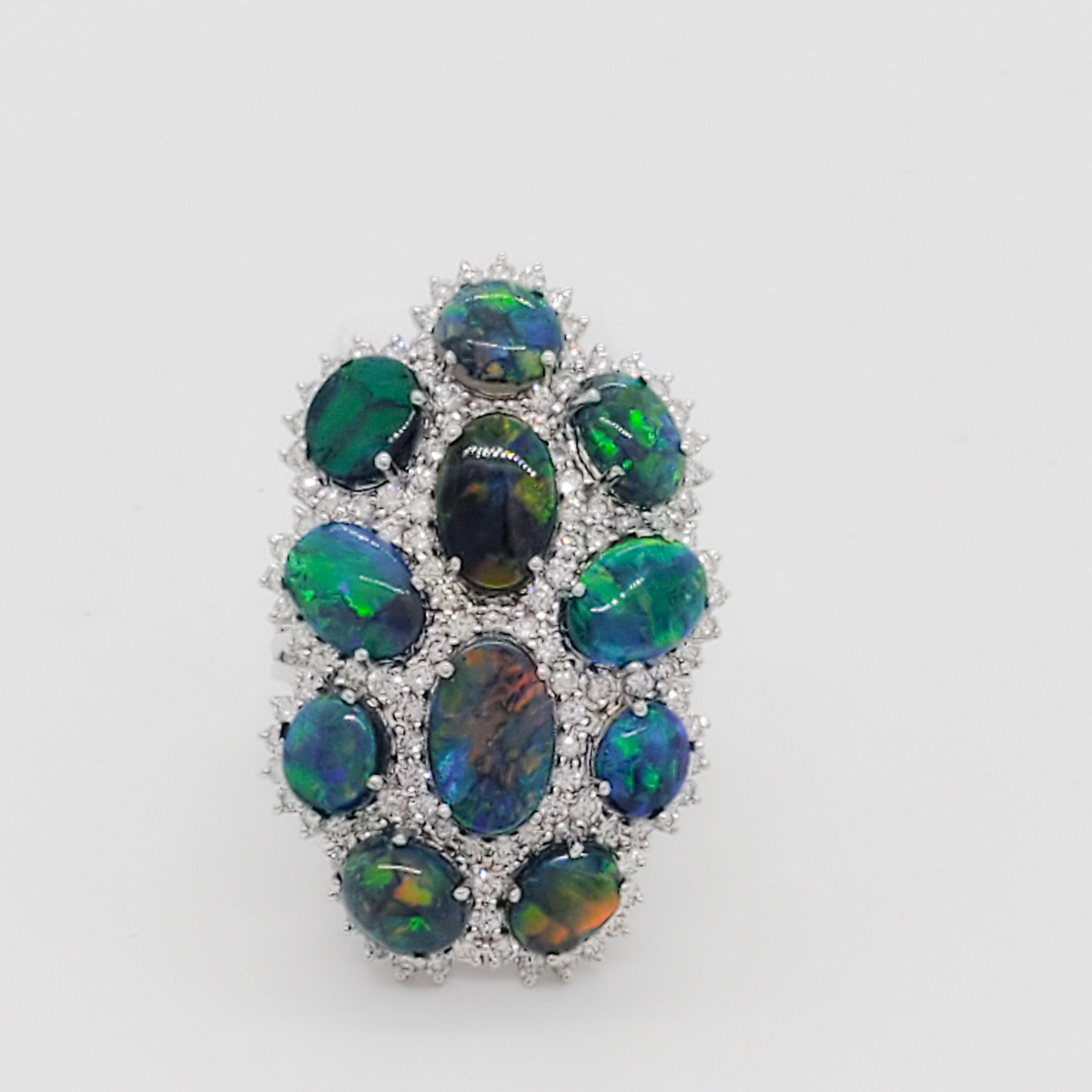 Oval Cut Black Opal and Diamond Cluster Ring in 18k White Gold