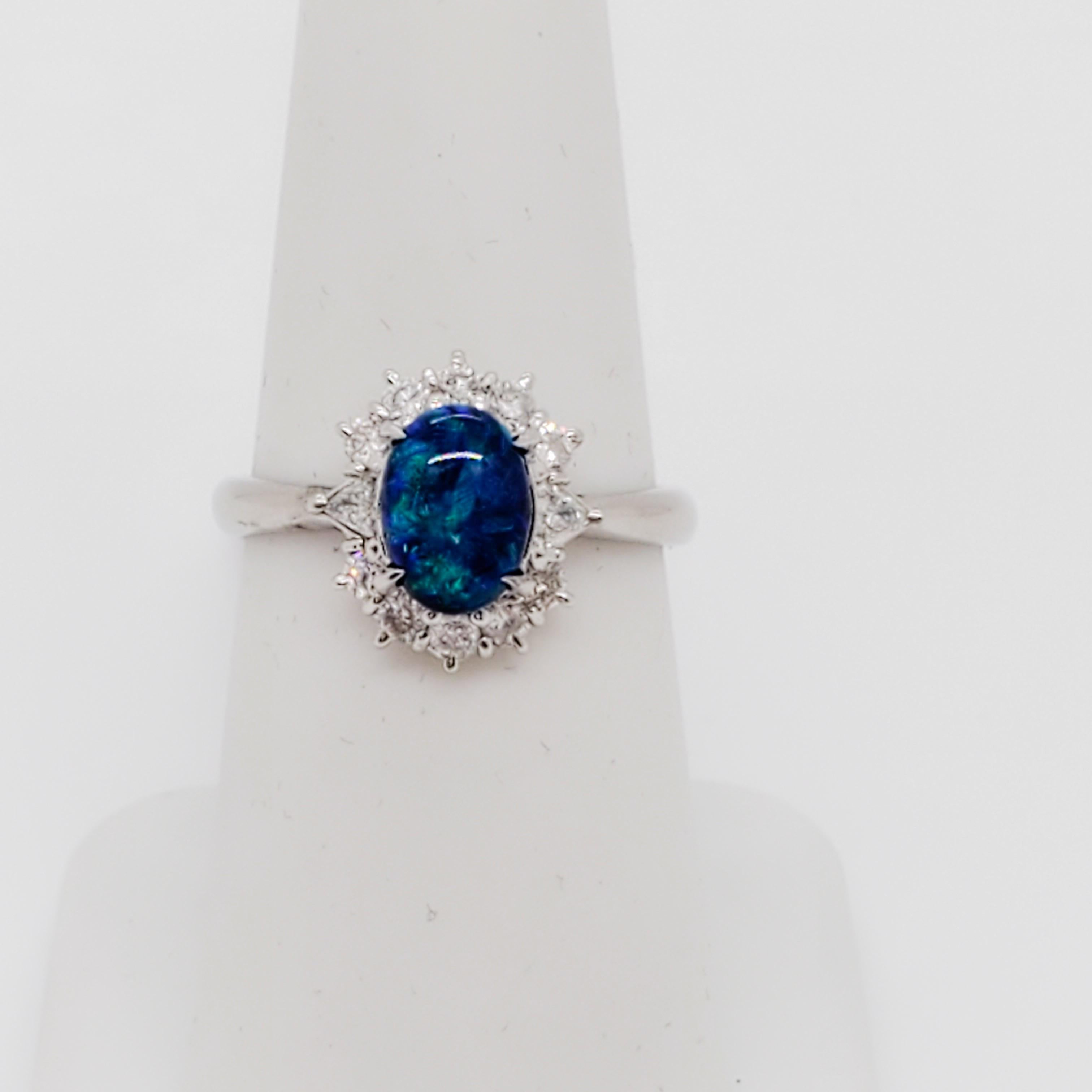 Estate Black Opal Oval and White Diamond Cluster Ring In Excellent Condition In Los Angeles, CA