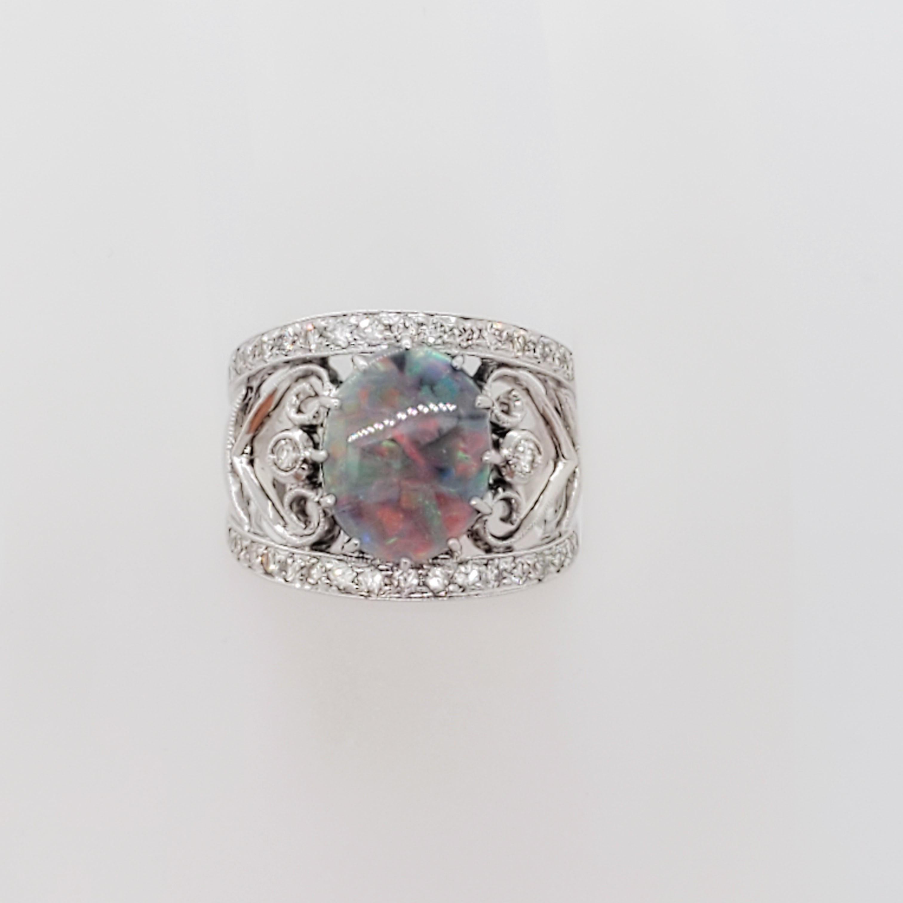 Estate Black Opal Oval and White Diamond Cocktail Ring in 18k White Gold In Excellent Condition In Los Angeles, CA